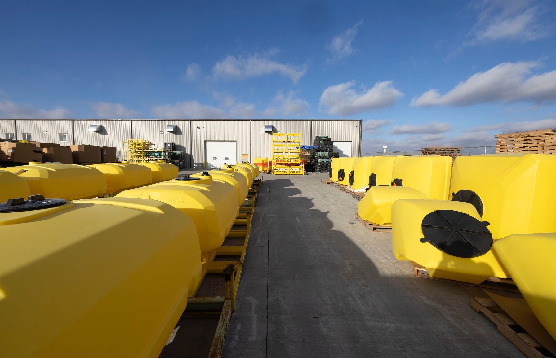 Finished hoppers for Deere & Co. wait for delivery.    PHOTO CREDIT: Stephen Gassman