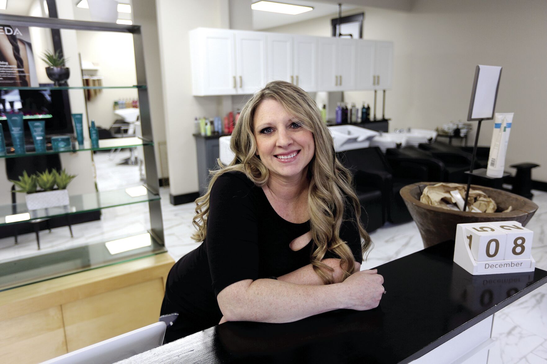 Cortney Herber is the owner of Meraki Salon and Spa and Extension Bar in Dubuque.    PHOTO CREDIT: Dave Kettering