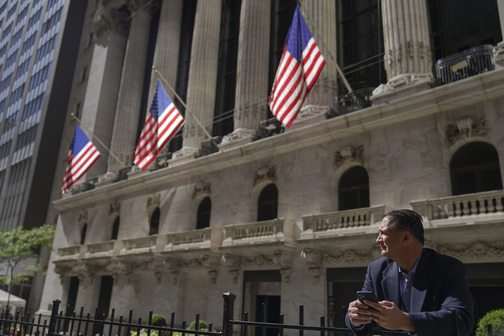 <p>FILE - A trader stands outside the New York Stock Exchange, Friday, Sept. 23, 2022, in New York. (AP Photo/Mary Altaffer)</p>   PHOTO CREDIT: Mary Altaffer