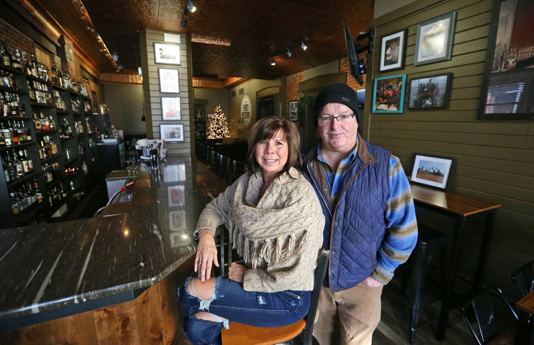 Leslie Haan and Tom Frith co-own First Reserve in Dubuque. Photo taken Tuesday, Dec. 20, 2022.    PHOTO CREDIT: JESSICA REILLY