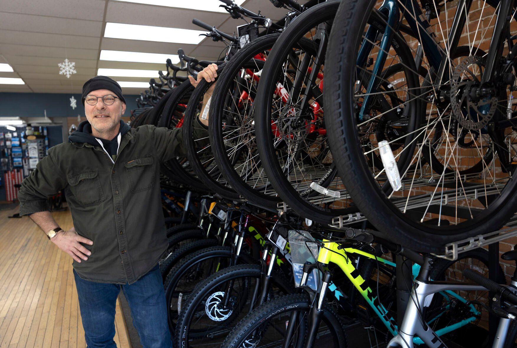 Longtime employee and future owner David Hartig stands in the current Bicycle World location on Central Avenue in Dubuque. The store is moving this spring after 50 years.    PHOTO CREDIT: Stephen Gassman