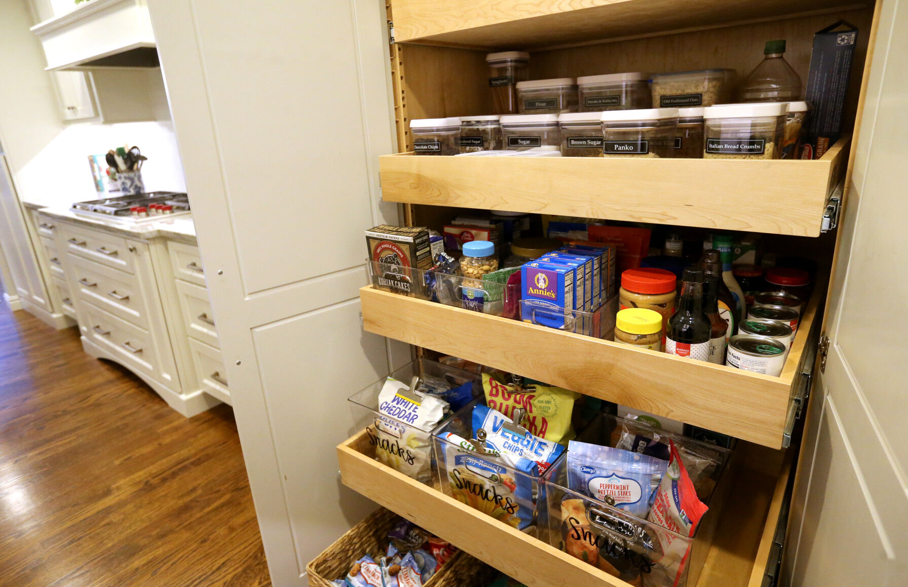 A pantry at Nicole Powers’ home in Dubuque on Wednesday Dec. 14, 2022. Powers owns Simply Organized Dubuque.    PHOTO CREDIT: JESSICA REILLY