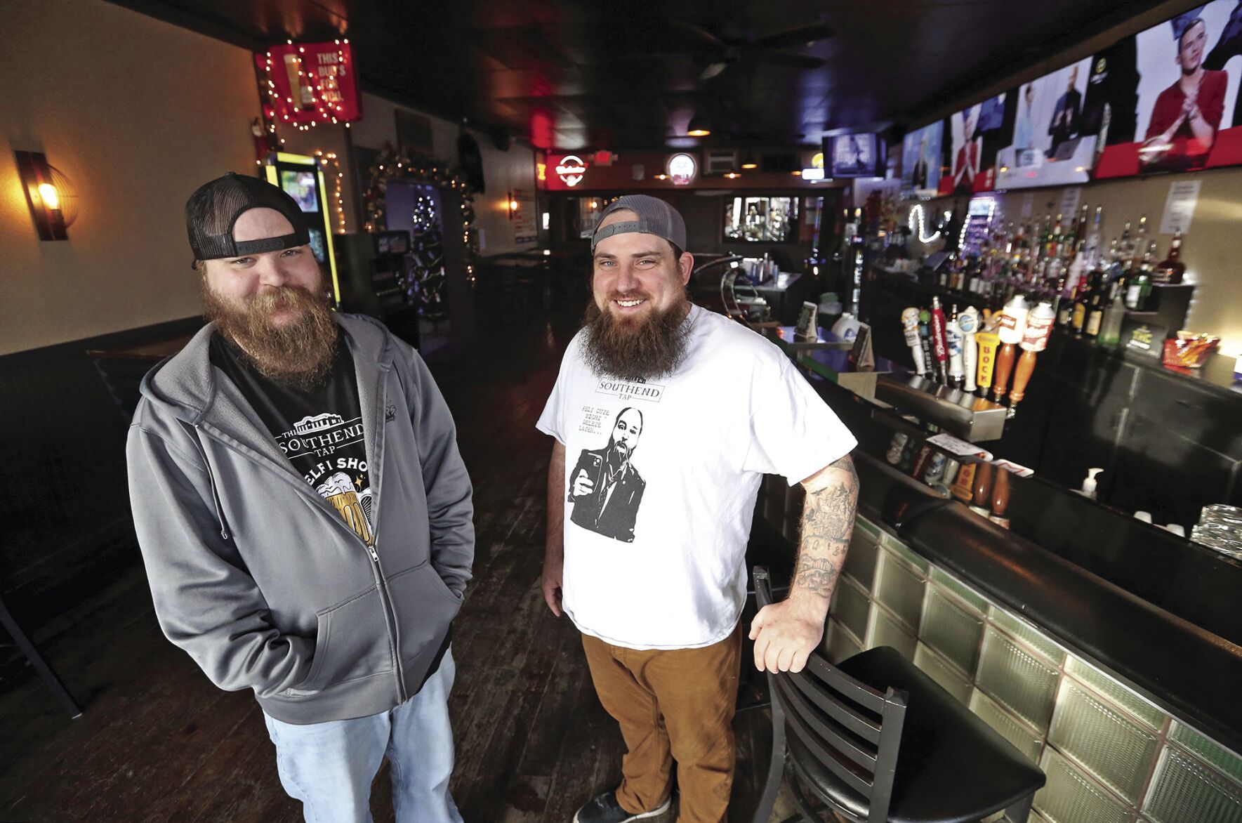 New owners Tom Besler (left) and Justin Rainey stand at The Southend Tap in Dubuque on Friday, Dec. 30, 2022.    PHOTO CREDIT: JESSICA REILLY