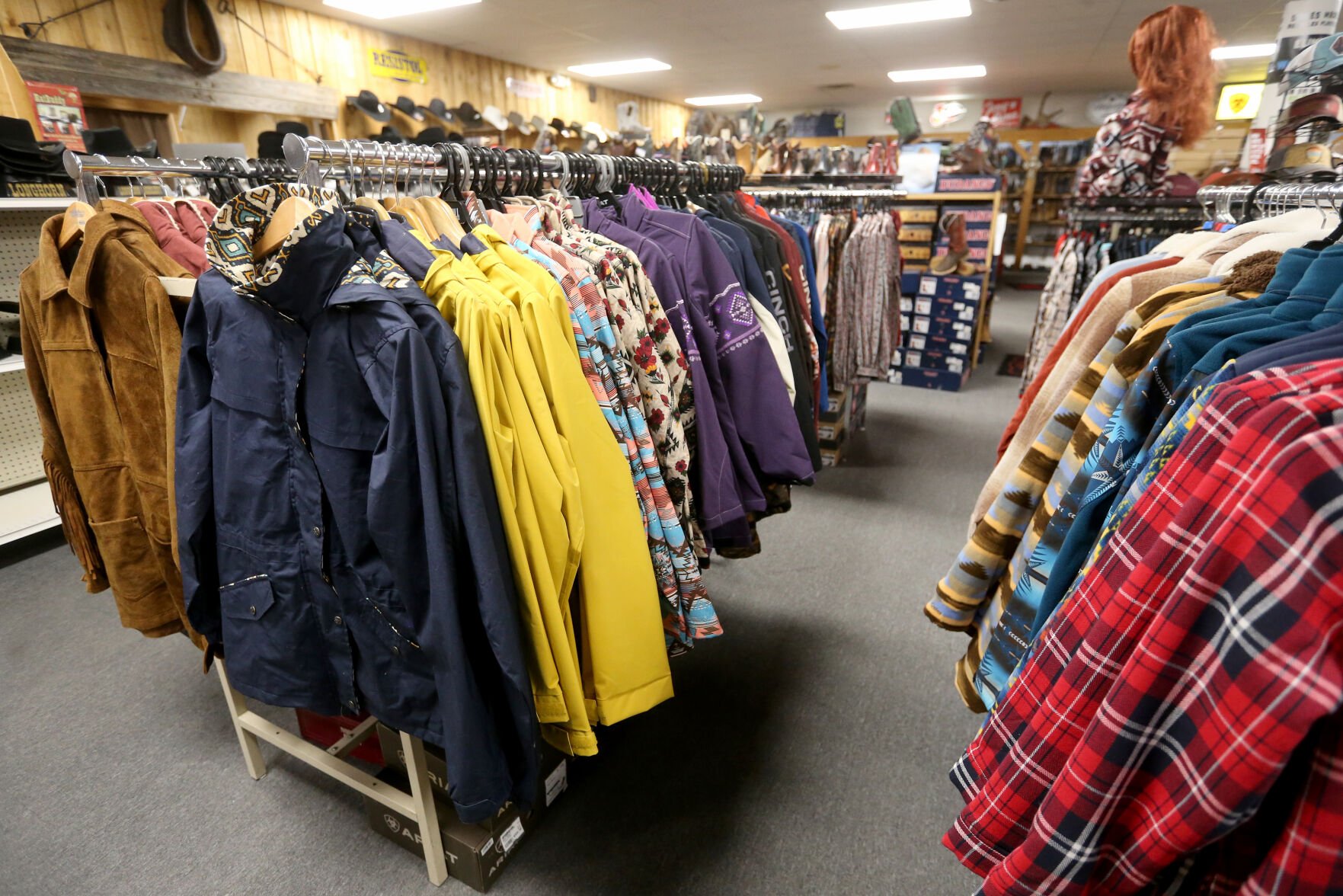 Clothing is displayed at Longhorn Saddlery in Dubuque on Friday, Dec. 30, 2022.    PHOTO CREDIT: JESSICA REILLY
