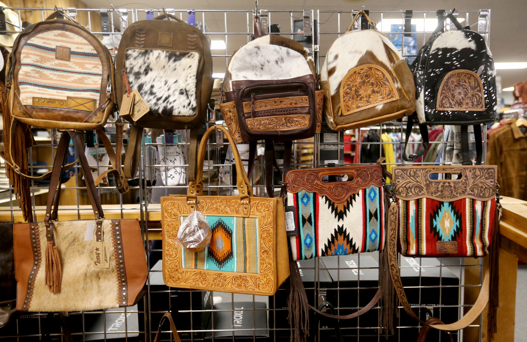 Bags are displayed at Longhorn Saddlery in Dubuque on Friday, Dec. 30, 2022.    PHOTO CREDIT: JESSICA REILLY