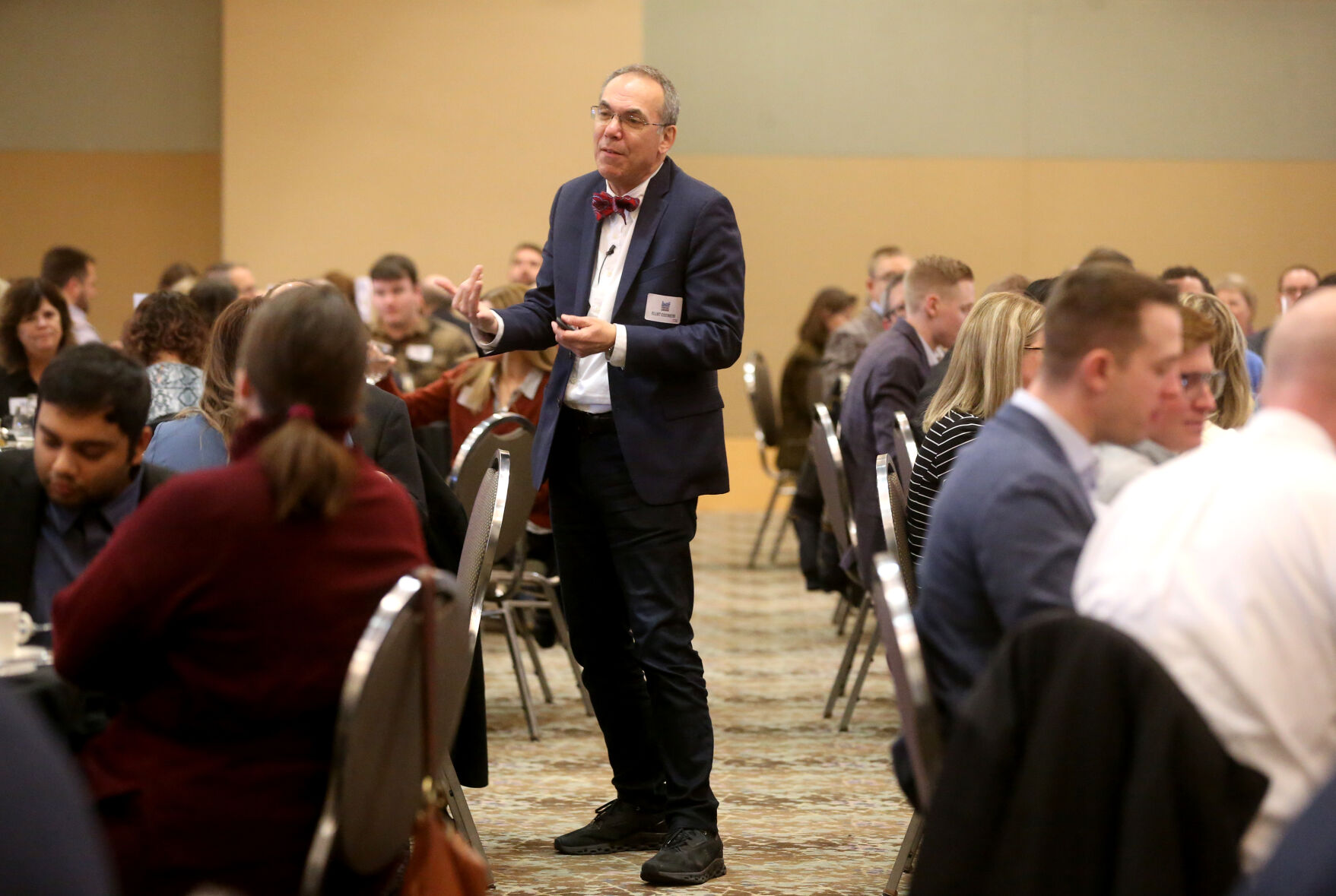 Keynote speaker Elliot Eisenberg addresses a crowd during the Dubuque Area Chamber of Commerce Forecast Luncheon at Grand River Center in Dubuque on Thursday, Jan. 19, 2023.    PHOTO CREDIT: JESSICA REILLY