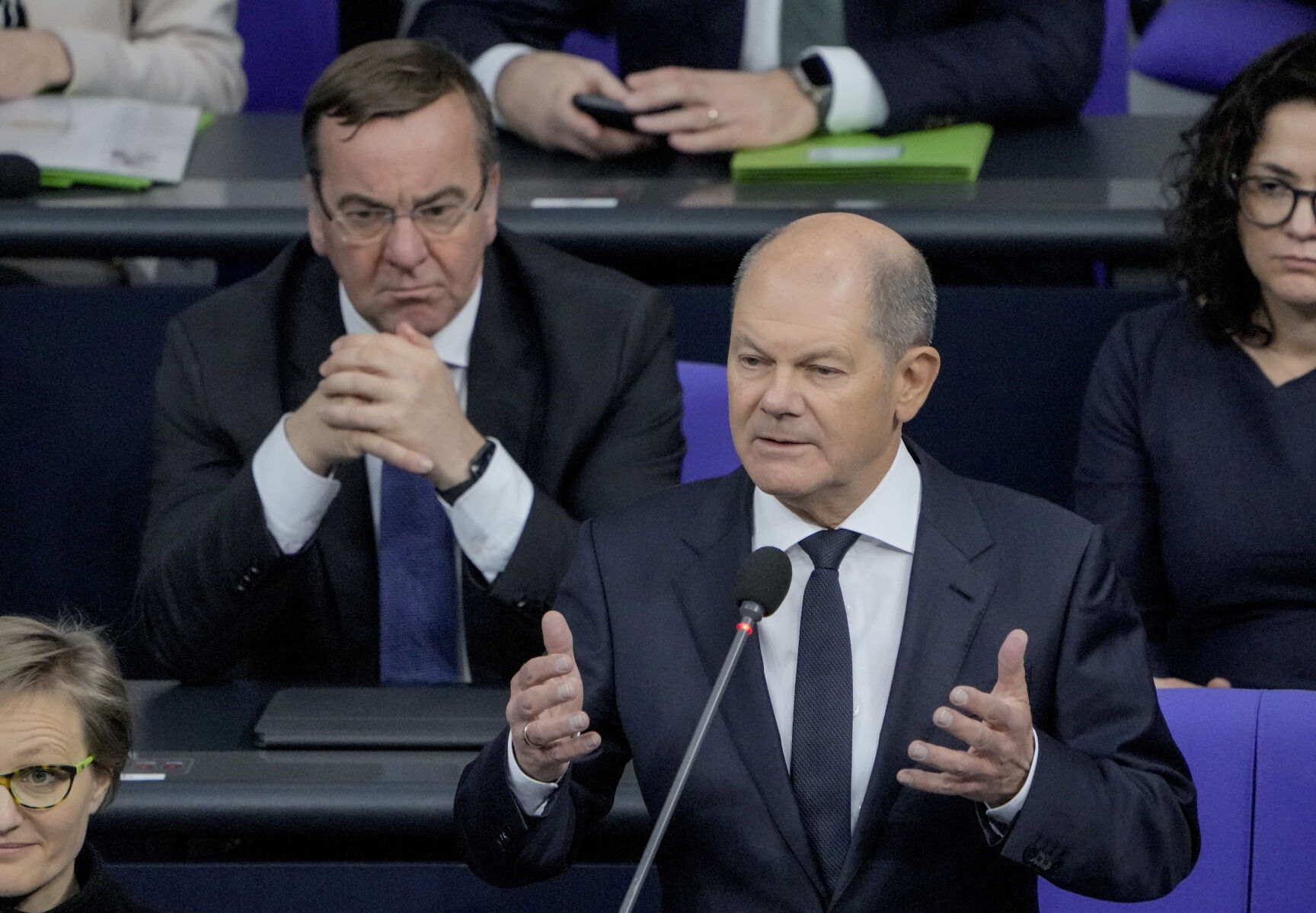 <p>German Chancellor Olaf Scholz, right, speaks to the lawmakers in the German parliament Bundestag in Berlin, Wednesday, Jan. 25, 2023. Left is defense minister Boris Pistorius. The German government has confirmed it will provide Ukraine with Leopard 2 battle tanks and approve requests by other countries to do the same. (Photo/Markus Schreiber)</p>   PHOTO CREDIT: Markus Schreiber - staff, AP