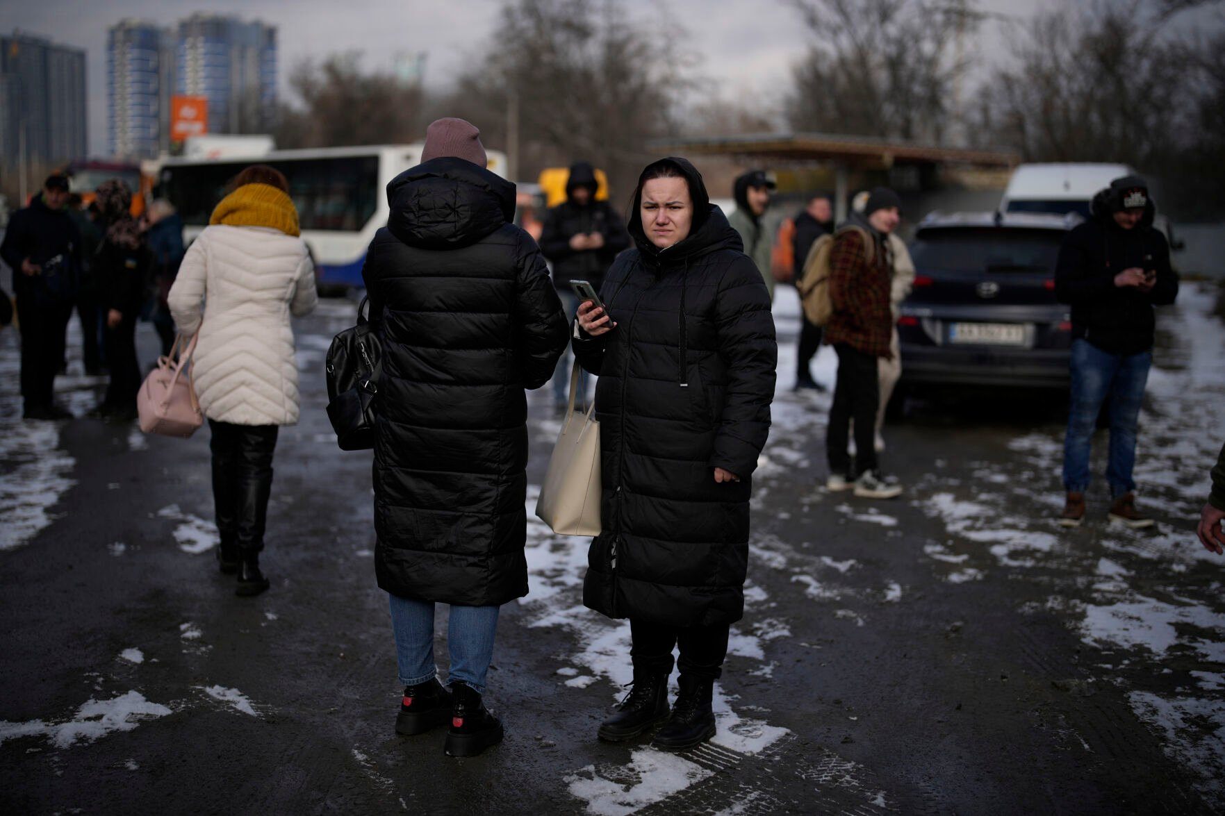<p>People wait on a street blocked by police after a rocket attack in Kyiv, Ukraine, Thursday, Jan. 26, 2023. (AP Photo/Daniel Cole)</p>   PHOTO CREDIT: Daniel Cole 
