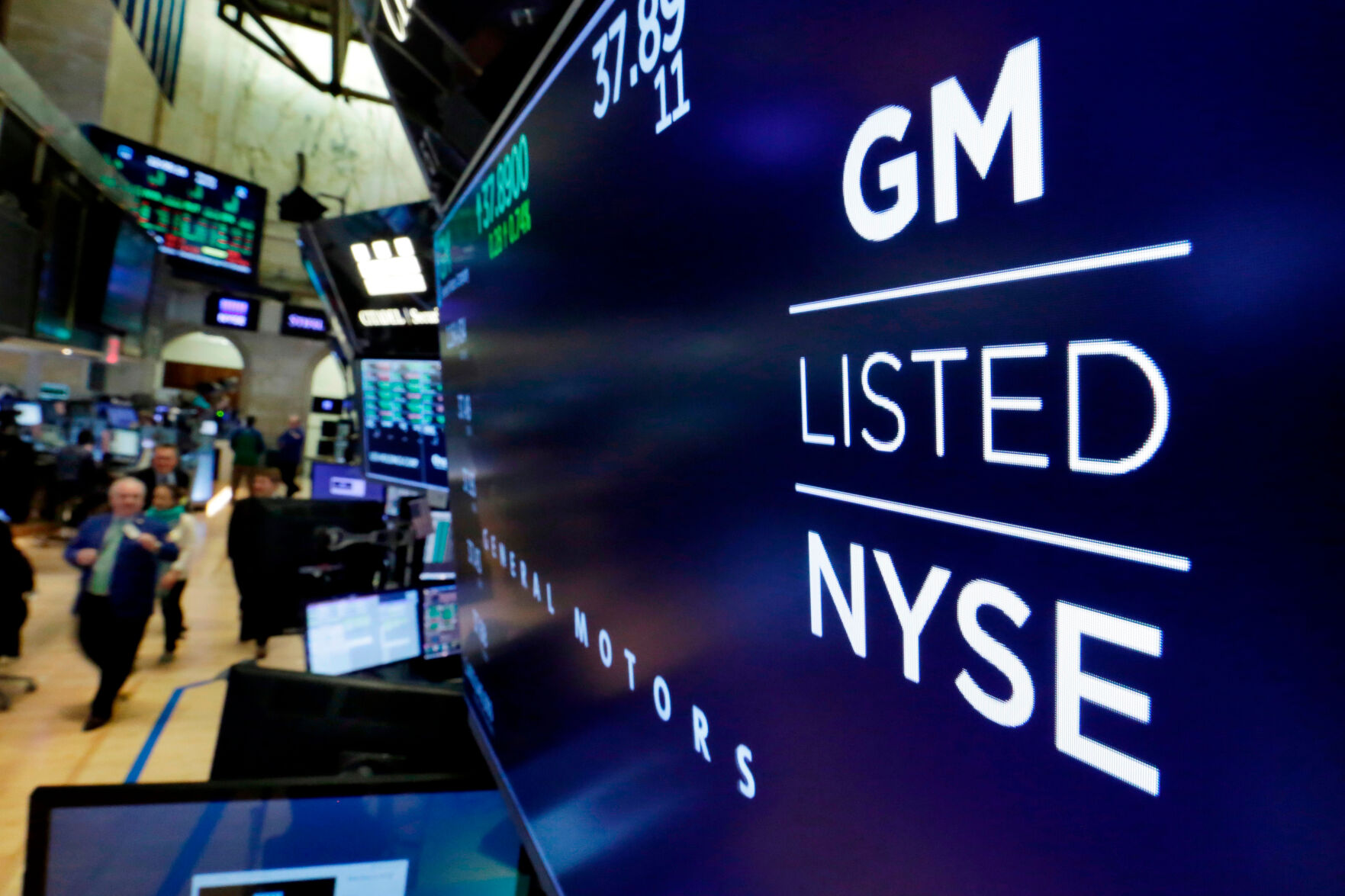 <p>FILE - In this April 23, 2018, file photo, the logo for General Motors appears above a trading post on the floor of the New York Stock Exchange. General Motors reports earnings Tuesday, Jan. 31, 2023. (AP Photo/Richard Drew, File)</p>   PHOTO CREDIT: Richard Drew 