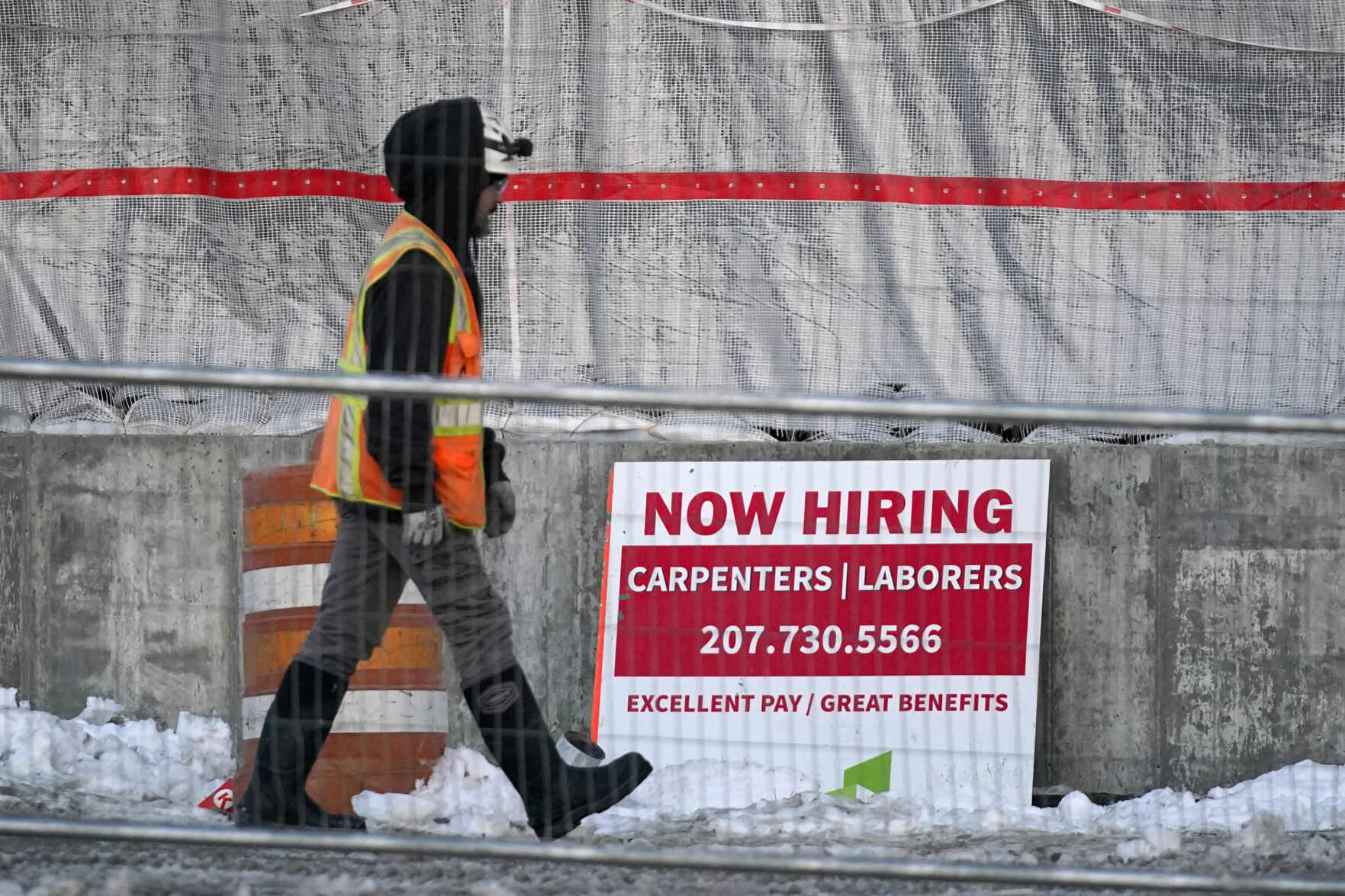 <p>A worker passes a hiring sign at a construction site, Wednesday, Jan. 25, 2023, in Portland, Maine. On Thursday, the Labor Department reports on the number of people who applied for unemployment benefits last week. (AP Photo/Robert F. Bukaty)</p>   PHOTO CREDIT: Robert F. Bukaty 