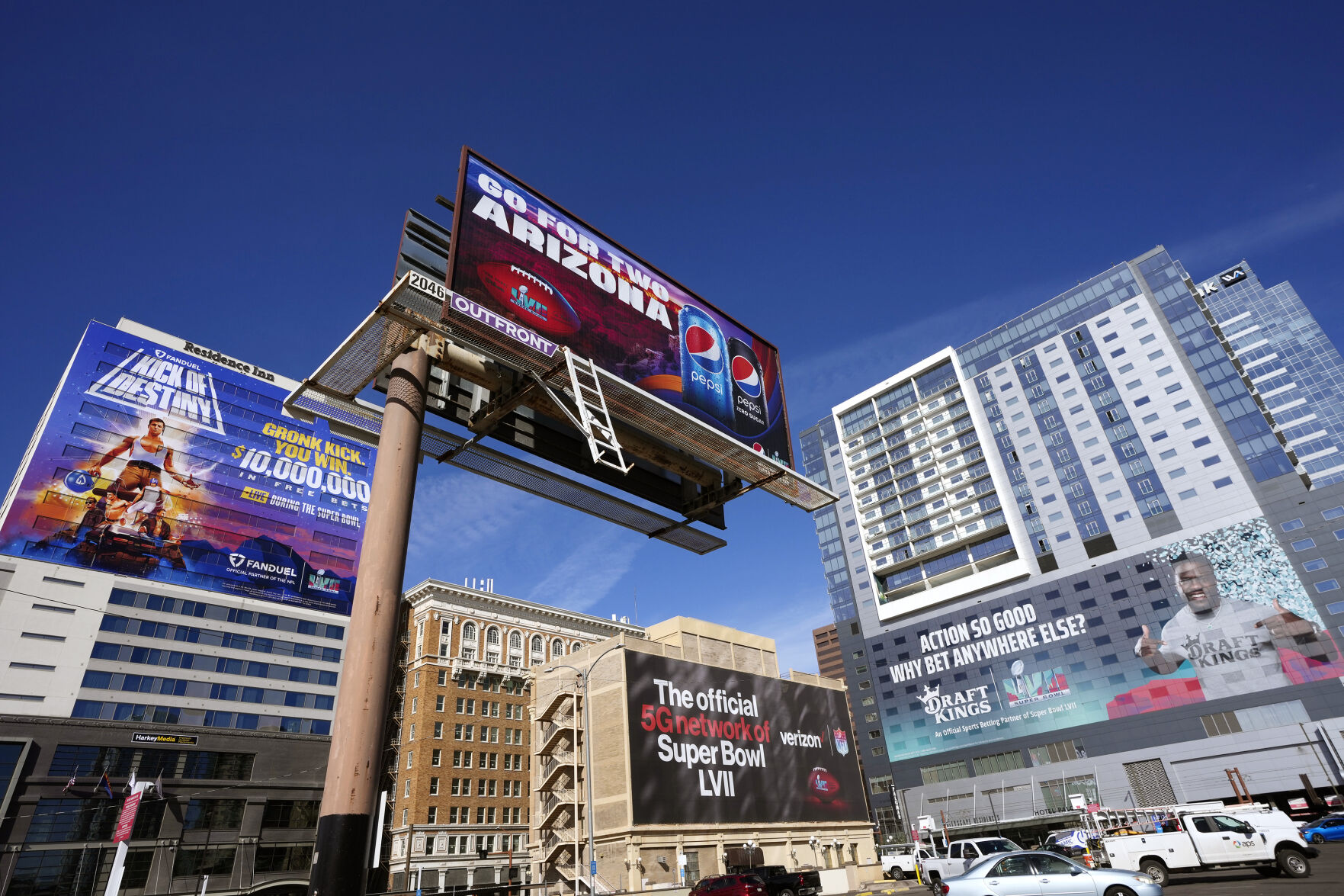 <p>Large advertisements adorn buildings and electronic billboards leading up to the NFL Super Bowl LVII football game in Phoenix, Friday, Feb. 3, 2023. (AP Photo/Ross D. Franklin)</p>   PHOTO CREDIT: Ross D. Franklin 