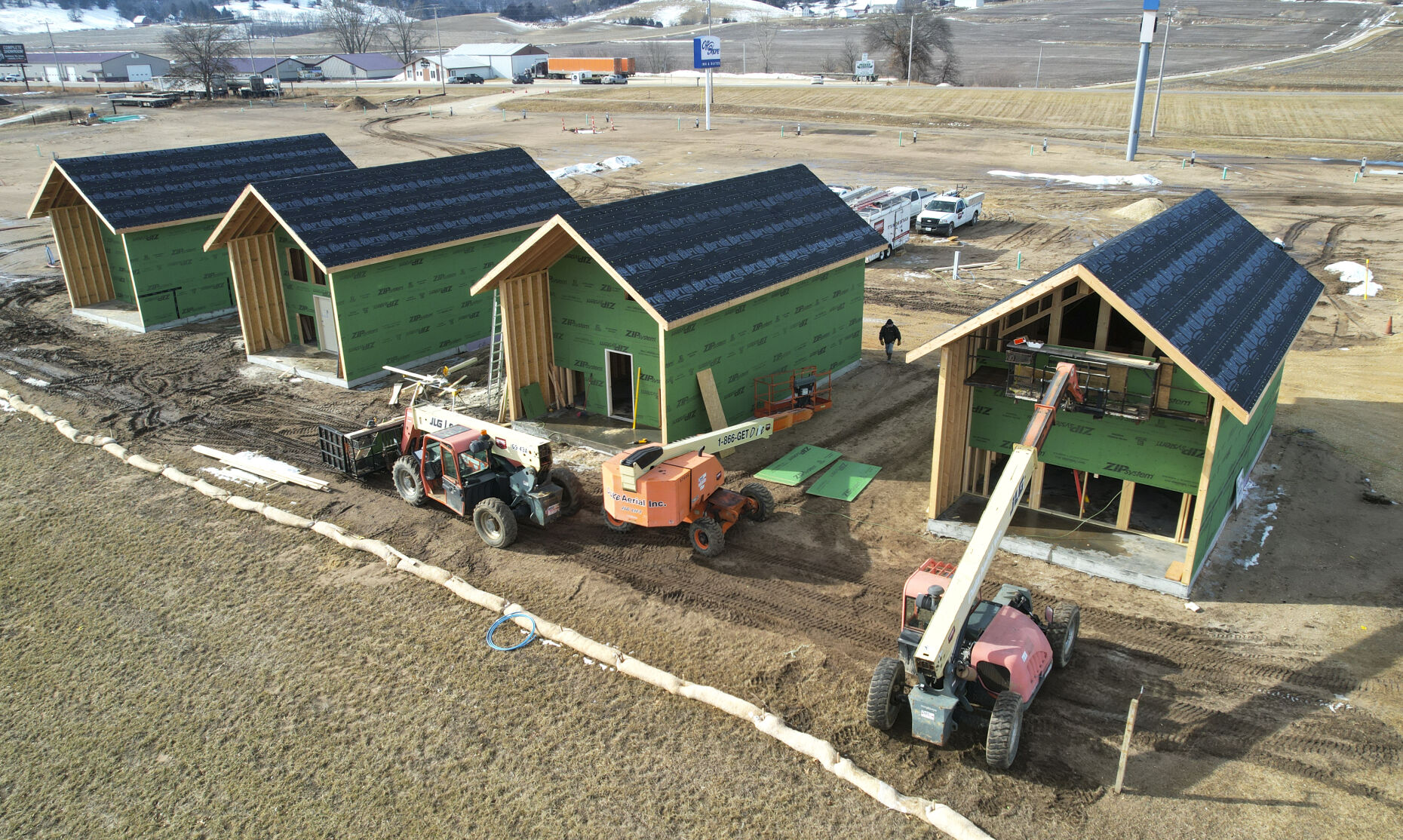 Construction crews work on building four villas at the Off Shore Resort in Bellevue, Iowa on Wednesday, Feb. 8, 2023.    PHOTO CREDIT: Dave Kettering