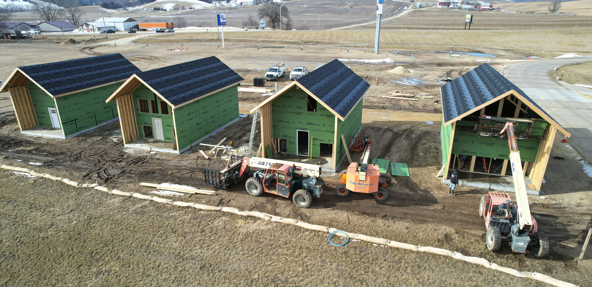 Construction crews work on building four villas at the Off Shore Resort in Bellevue, Iowa on Wednesday, Feb. 8, 2023.    PHOTO CREDIT: Dave Kettering
