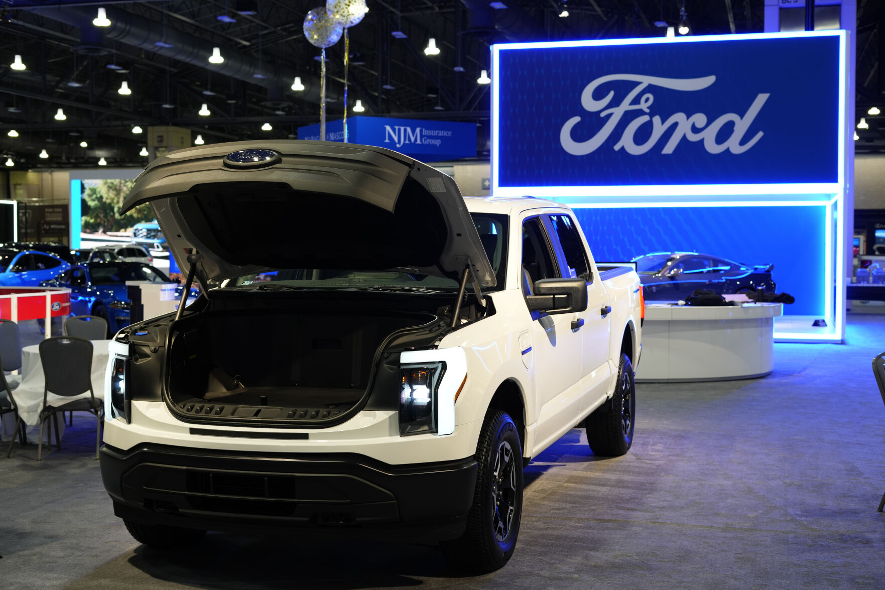 <p>FILE - The Ford F-150 Lightning displayed at the Philadelphia Auto Show, Jan. 27, 2023, in Philadelphia. Ford Motor Co. says it has suspended production and halted shipments of the F-150 Lightning electric pickup after a battery caught fire during a pre-delivery quality check. On Wednesday, Feb. 15, the automaker said in a statement it has no reason to believe electric pickups already in use by customers are affected by the battery issue.(AP Photo/Matt Rourke, File)</p>   PHOTO CREDIT: Matt Rourke - staff, AP