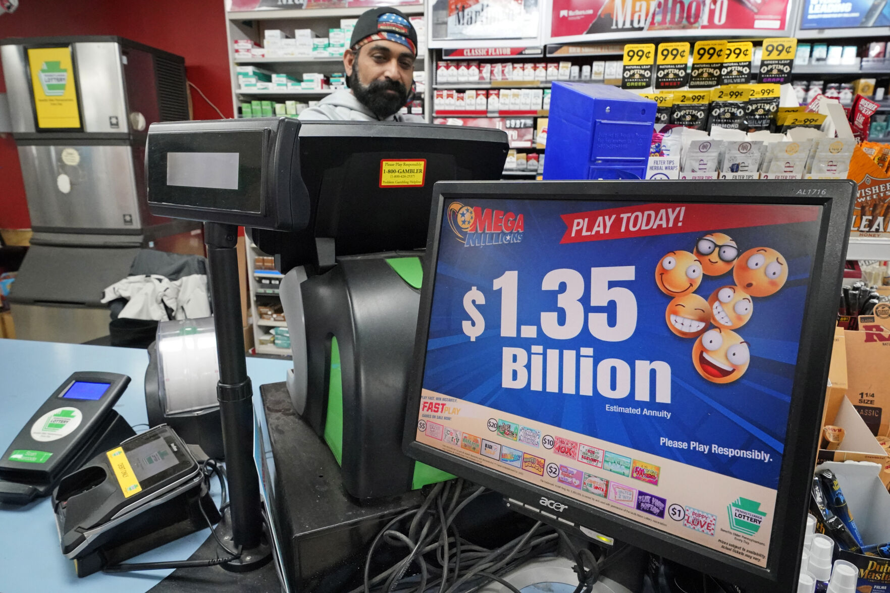 <p>FILE - A Mega Million sign displays the estimated jackpot of $1.35 Billion at the Cranberry Super Mini Mart in Cranberry, Pa., Jan. 12, 2023. The winner of a $1.35 billion Mega Millions jackpot has come forward to collect the prize. The Maine State Lottery announced Wednesday, Feb. 22, that the winner chose to remain anonymous and collect the cash option through a limited liability company instead of receiving the full amount in payments over time. (AP Photo/Gene J. Puskar, File)</p>   PHOTO CREDIT: Gene J. Puskar 