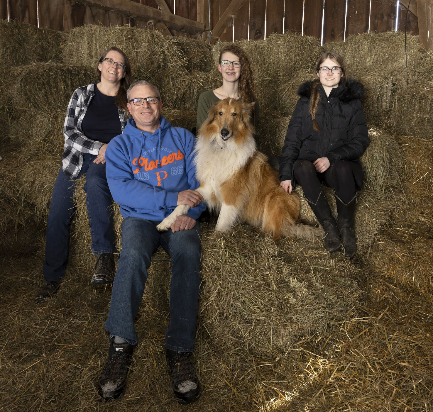 The Kilian family (from left): Melissa; Kerwin; Caroline, 15; Clara, 17; and dog Pal.    PHOTO CREDIT: Stephen Gassman
Telegraph Herald