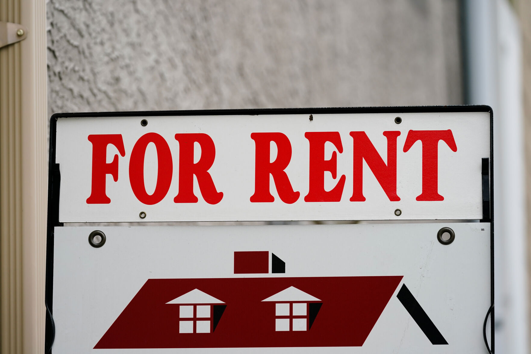 <p>FILE - A "For Rent" sign is displayed outside a building in Philadelphia, June 22, 2022. The cost of renting an apartment is easing after skyrocketing in recent years, though it remain painfully high for many Americans. The U.S. median rent rose 2.4% in January 2023 from a year earlier to $1,942, the lowest annual increase since June 2021, according to data from Rent, which tracks listings for apartment and rental houses. (AP Photo/Matt Rourke, File)</p>   PHOTO CREDIT: Matt Rourke 