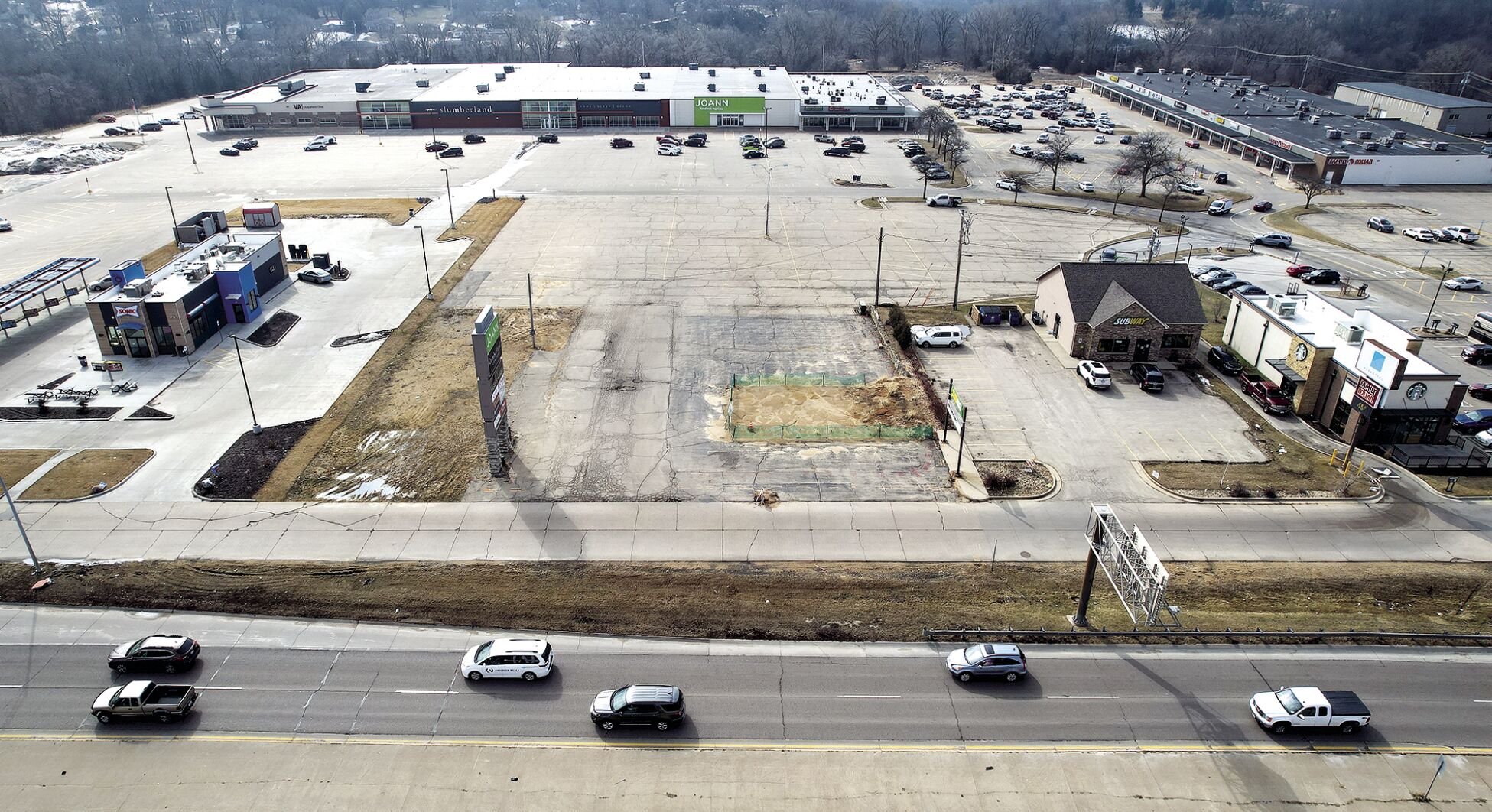 Aldi is planning a new supermarket between Sonic (left) and Starbucks (far right) in Dubuque’s Plaza 20.    PHOTO CREDIT: Dave Kettering