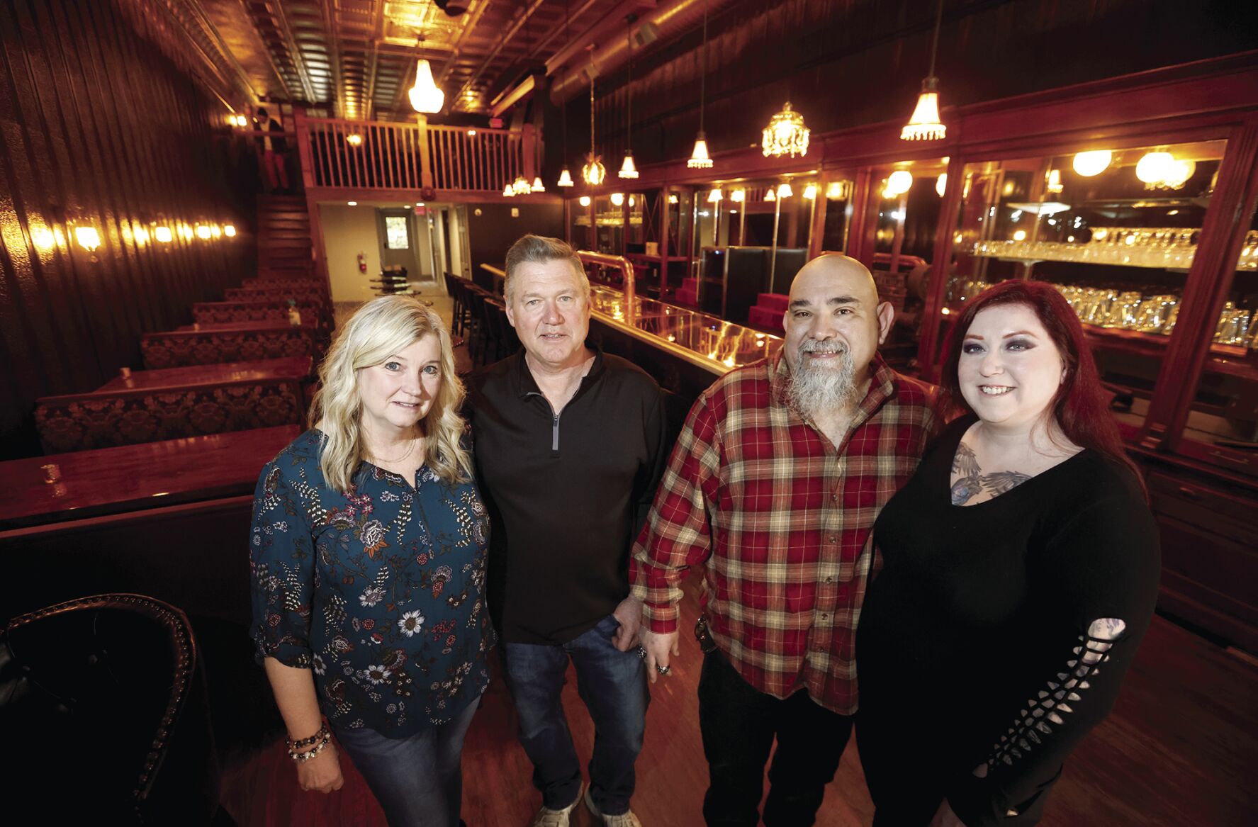 The Lion’s Den in Galena, Ill., is owned by Becky and Roger Gates, (left) while Ismael and Christina De Leon will run the business. The downtown bar is holding a soft opening this week.    PHOTO CREDIT: JESSICA REILLY