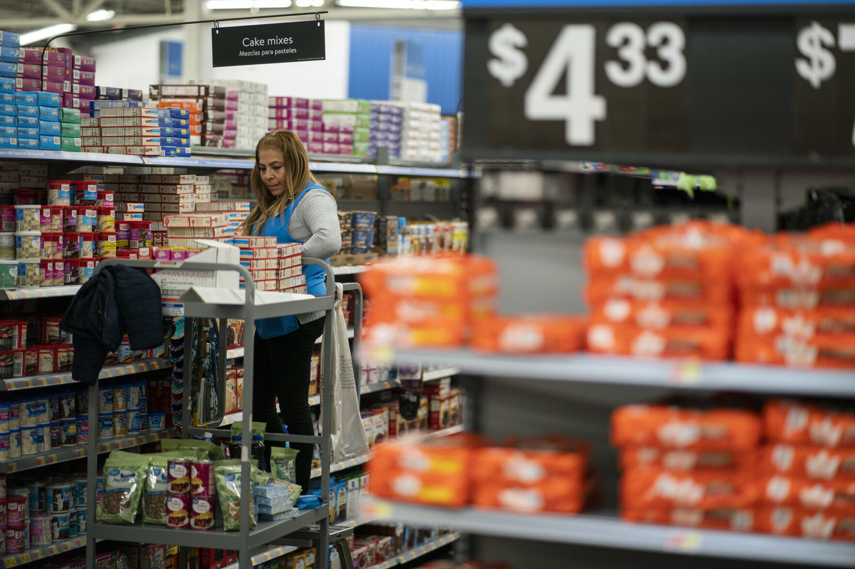 <p>A worker organizes items at a Walmart Supercenter in North Bergen, N.J., on Thursday, Feb. 9, 2023. On Tuesday, the Labor Department reports on U.S. consumer prices for February. (AP Photo/Eduardo Munoz Alvarez)</p>   PHOTO CREDIT: Eduardo Munoz Alvarez 