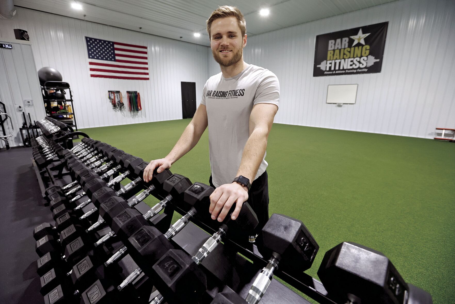 Brandon Hogan, owner of Bar Raising Fitness, recently opened a new location in Dubuque.    PHOTO CREDIT: JESSICA REILLY