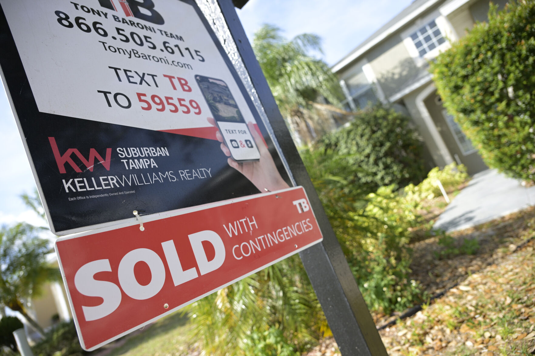 <p>A real estate sign is posted outside of a recently sold home, Tuesday, Feb. 21, 2023, in Valrico, Fla. On Tuesday, (AP Photo/Phelan M. Ebenhack)</p>   PHOTO CREDIT: Phelan M. Ebenhack 