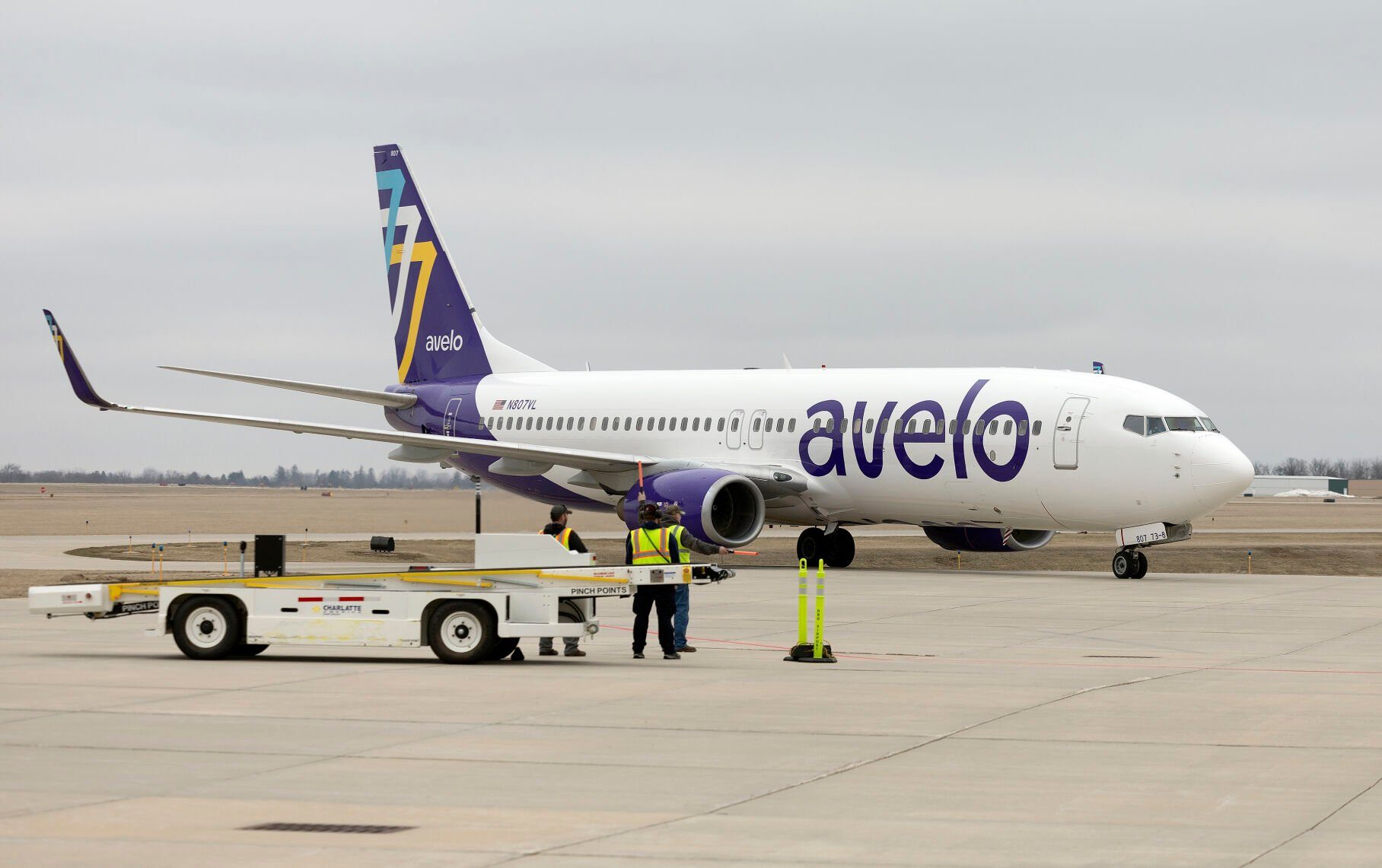 An Avelo Airlines jet taxis down the runway after touching down at Dubuque Regional Airport for Avelo’s inaugural local flight on Wednesday.    PHOTO CREDIT: Gassman