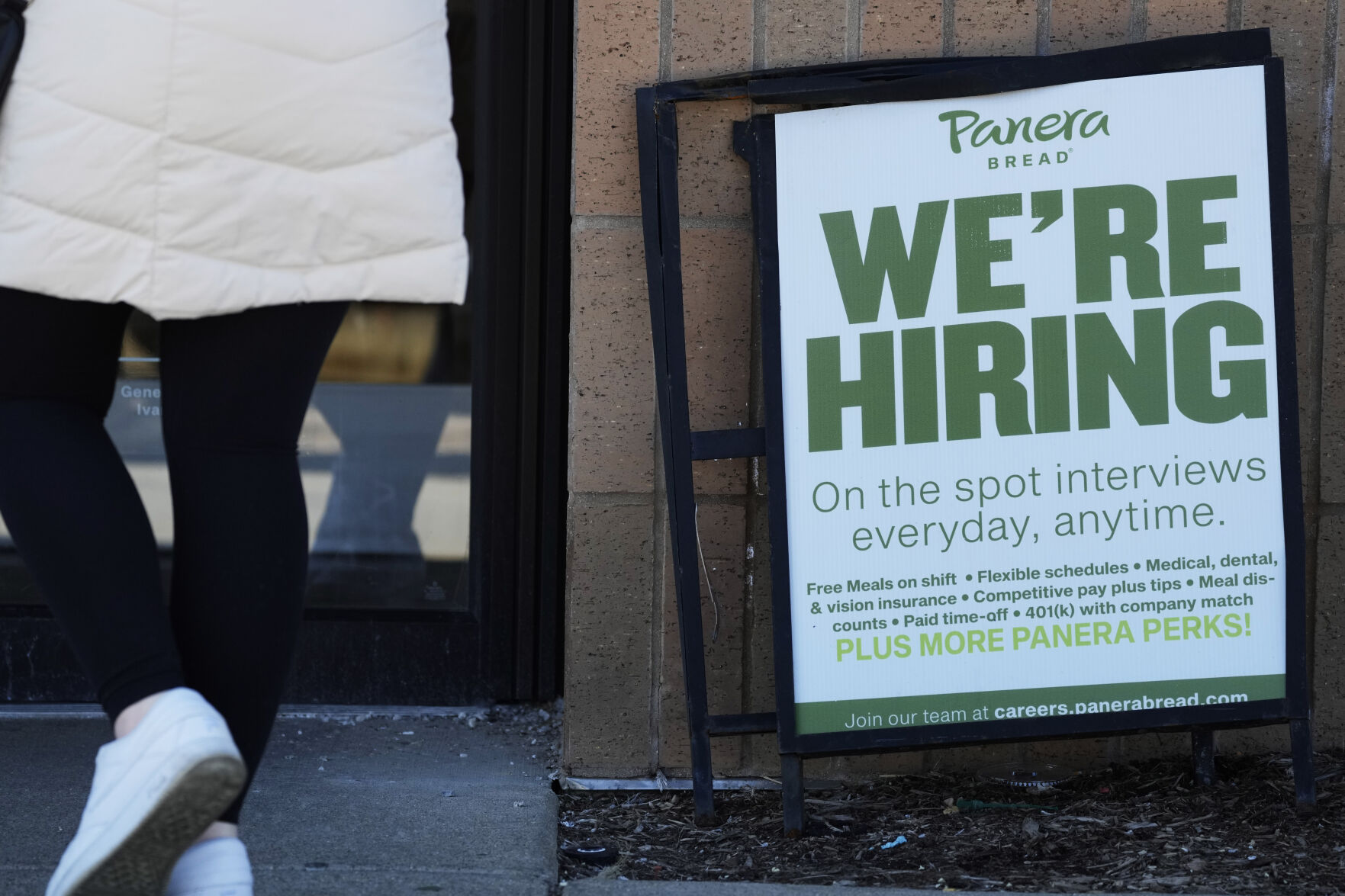 <p>A hiring sign is displayed at a restaurant in Mount Prospect, Ill., Sunday, March 19, 2023. On Thursday, the Labor Department reports on the number of people who applied for unemployment benefits last week. (AP Photo/Nam Y. Huh)</p>   PHOTO CREDIT: Nam Y. Huh 