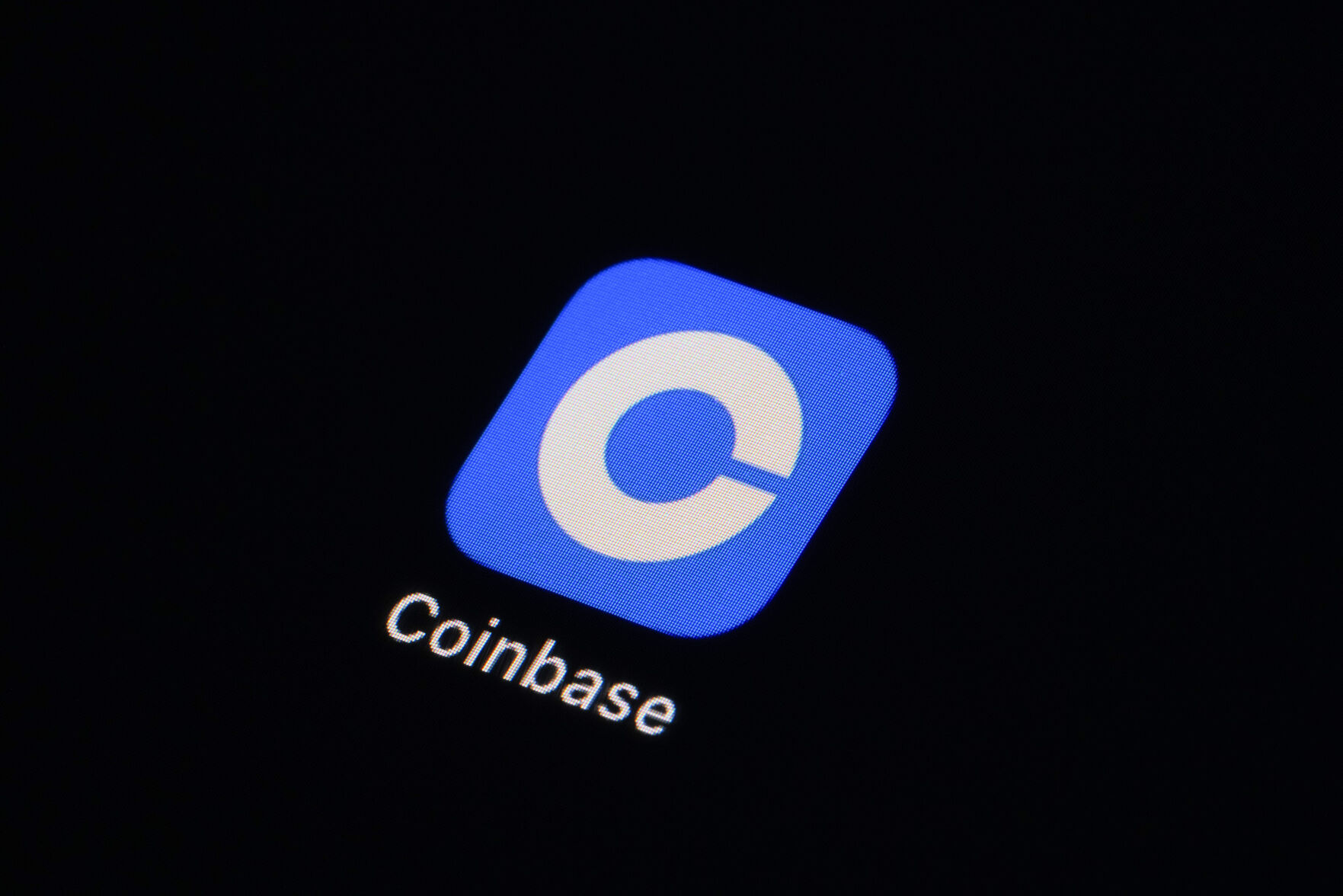 <p>The Coinbase app icon is seen on a smartphone, Tuesday, Feb. 28, 2023, in Marple Township, Pa. Coinbase’s stock is tumbling before the market open on Thursday, March 23, after the cryptocurrency trading platform received a warning from the Securities and Exchange Commission that it could possibly face securities charges. (AP Photo/Matt Slocum)</p>   PHOTO CREDIT: Matt Slocum 