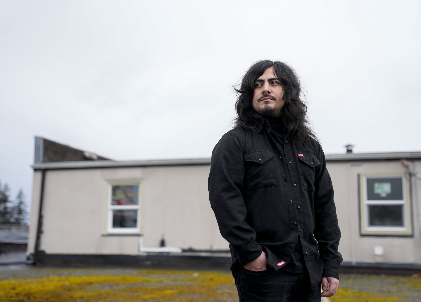 <p>Santos Enrique Camara, who dropped out of Shoreline Community College at age 19 in 2015 after completing one semester studying audio engineering, poses for a portrait outside his home Friday, March 24, 2023, in Marysville, Wash. Camara, now 27, had difficulty paying tuition and finding time to do schoolwork while caring for his younger sister. "I seriously tried," he said. "I gave it my all." For now, Camara is happy working as a sous-chef and cook at a local restaurant while planning a tour with one of his two bands. (AP Photo/Lindsey Wasson)</p>   PHOTO CREDIT: Lindsey Wasson