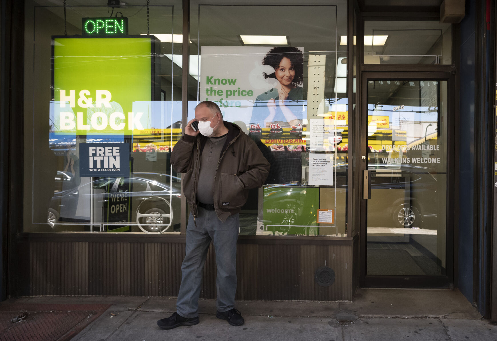 <p>FILE - A man waits outside a H&R Block tax preparation office on Monday, April 6, 2020, in the Brooklyn borough of New York. Tax season is here again. Whether you do your taxes by yourself, go to a tax clinic or hire a professional, navigating the tax system can be complicated. (AP Photo/Mark Lennihan, File)</p>   PHOTO CREDIT: Mark Lennihan 