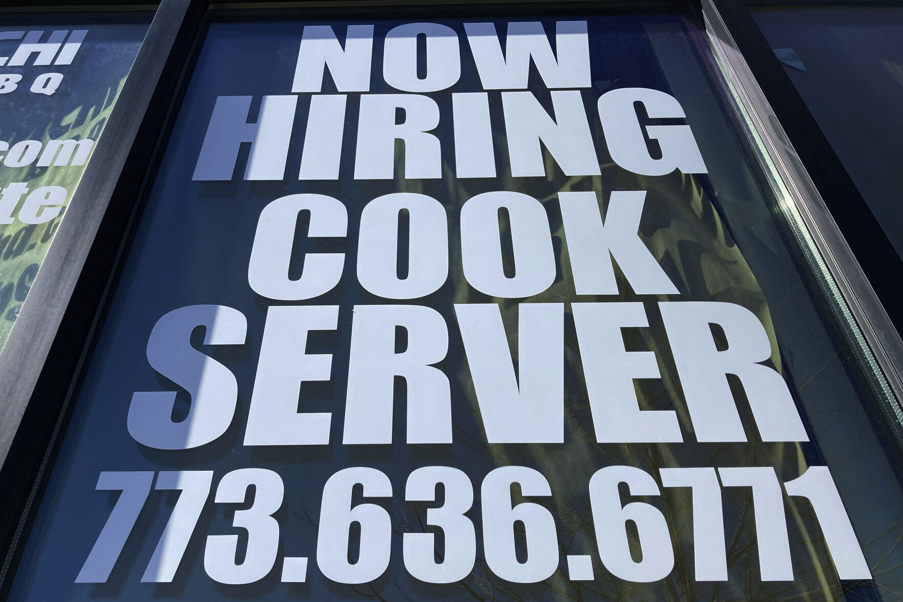 <p>A hiring sign is displayed at a restaurant in Mount Prospect, Ill., Sunday, March 19, 2023. On Thursday, the Labor Department reports on the number of people who applied for unemployment benefits last week. (AP Photo/Nam Y. Huh)</p>   PHOTO CREDIT: Nam Y. Huh 