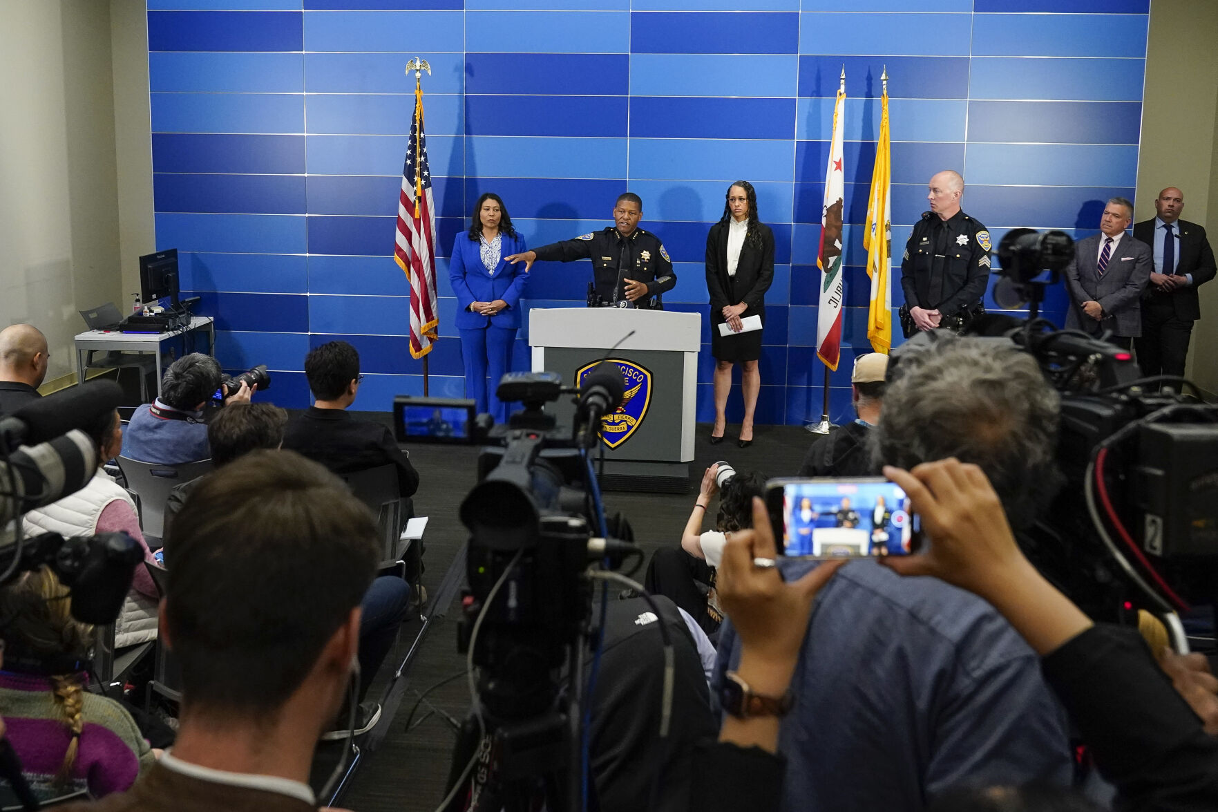 <p>San Francisco Police chief William Scott, center, provides an update on the homicide investigation of Robert Lee during a press conference where officials announced the arrest of a suspect, Thursday, April 13, 2023, in San Francisco. (AP Photo/Godofredo A. Vásquez)</p>   PHOTO CREDIT: Godofredo A. Vásquez - staff, AP