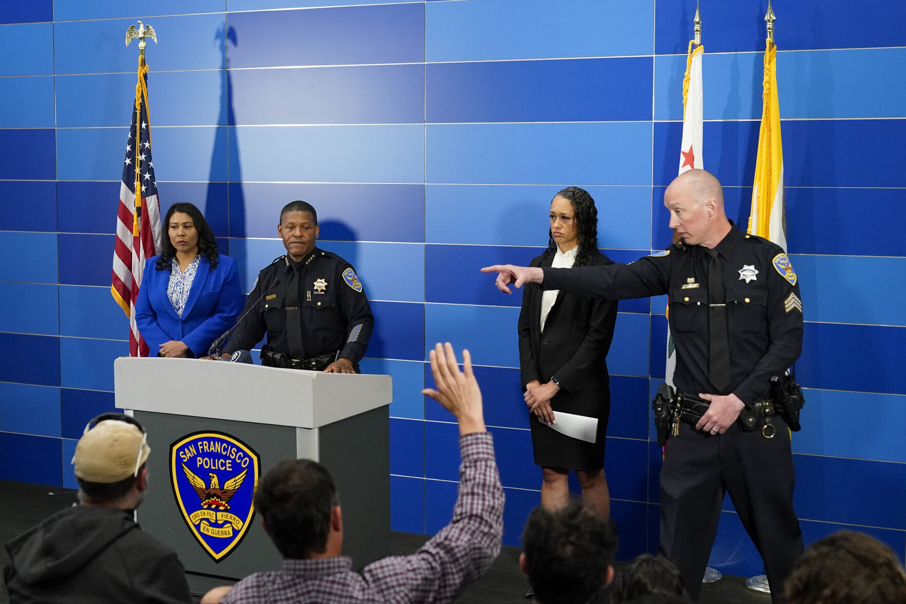 <p>San Francisco Police Chief William Scott, second from left, answers questions from reporters during a press conference where officials announced the arrest of a suspect in the homicide investigation of Robert Lee, Thursday, April 13, 2023, in San Francisco. (AP Photo/Godofredo A. Vásquez)</p>   PHOTO CREDIT: Godofredo A. V·squez - staff, AP
