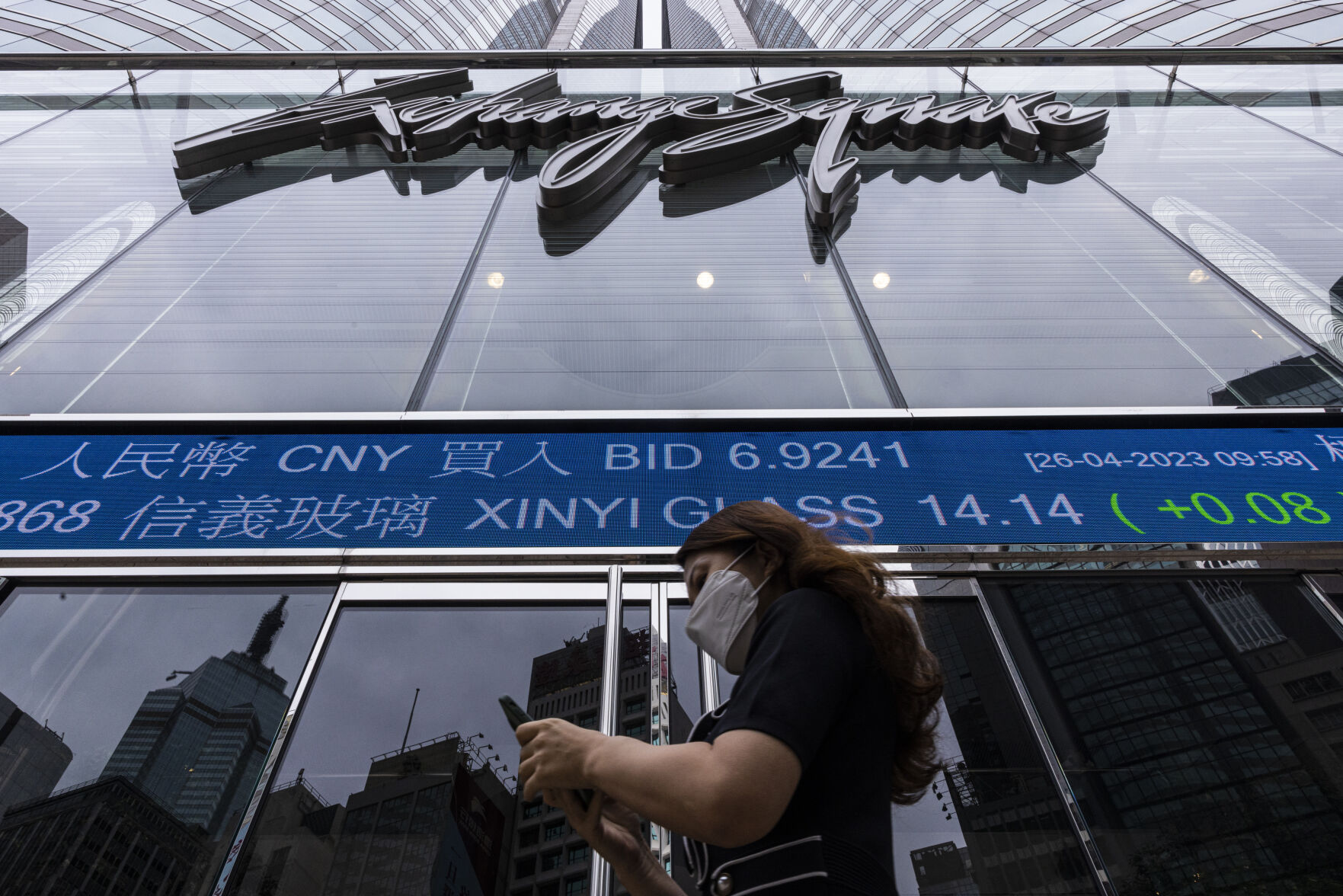 <p>A pedestrian passes by the Hong Kong Stock Exchange electronic screen in Hong Kong, Wednesday, April 26, 2023. Asian shares are trading mostly lower, as worries about the health of global economies grew after a tumble on Wall Street despite some better-than-expected earnings reports. (AP Photo/Louise Delmotte)</p>   PHOTO CREDIT: Louise Delmotte - staff, AP