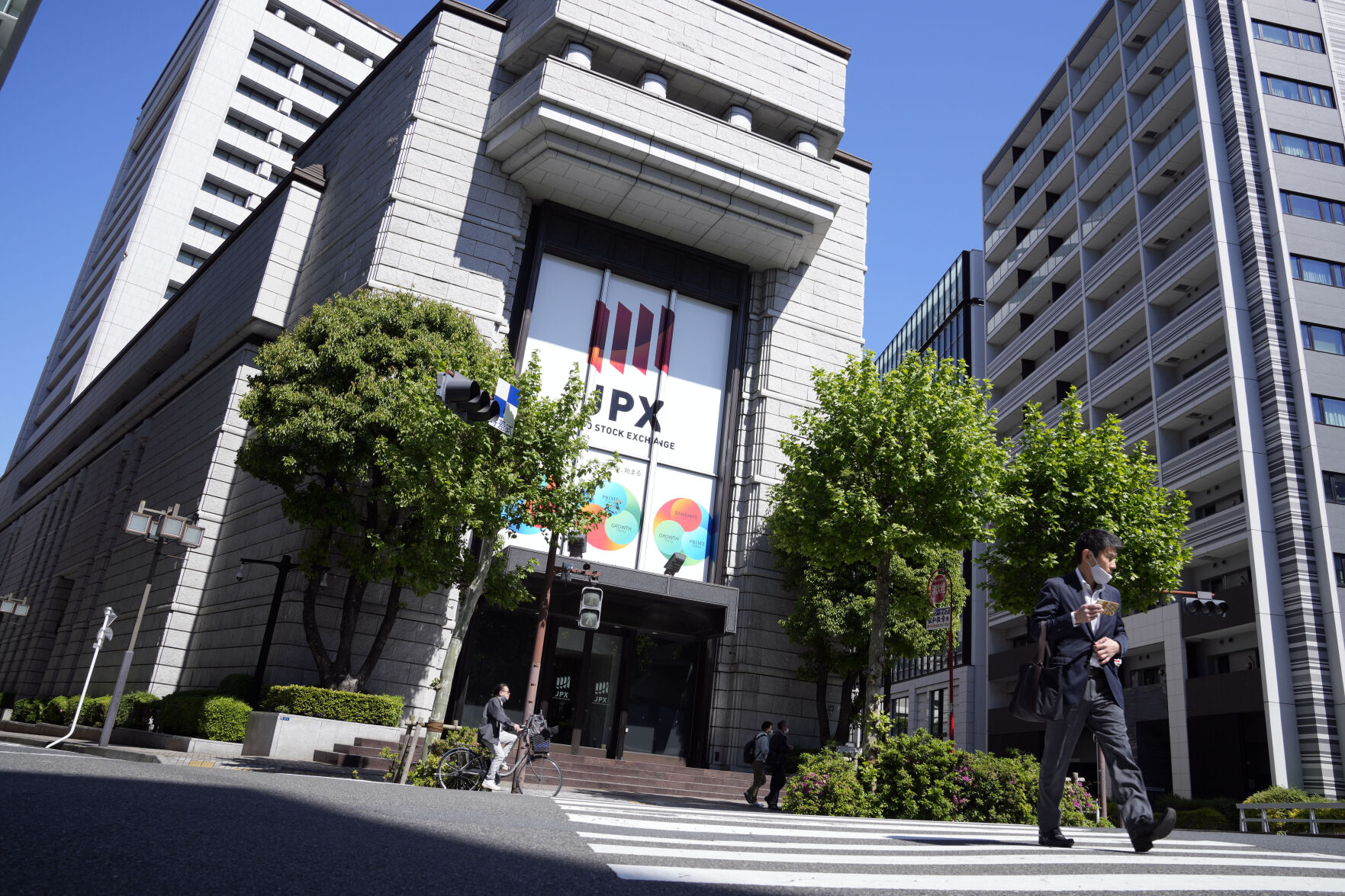 <p>Tokyo Stock Exchange building is seen Thursday, April 27, 2023, in Tokyo. Shares advanced in Asia on Friday after Wall Street rallied to its best day since January. (AP Photo/Eugene Hoshiko)</p>   PHOTO CREDIT: Eugene Hoshiko - staff, AP