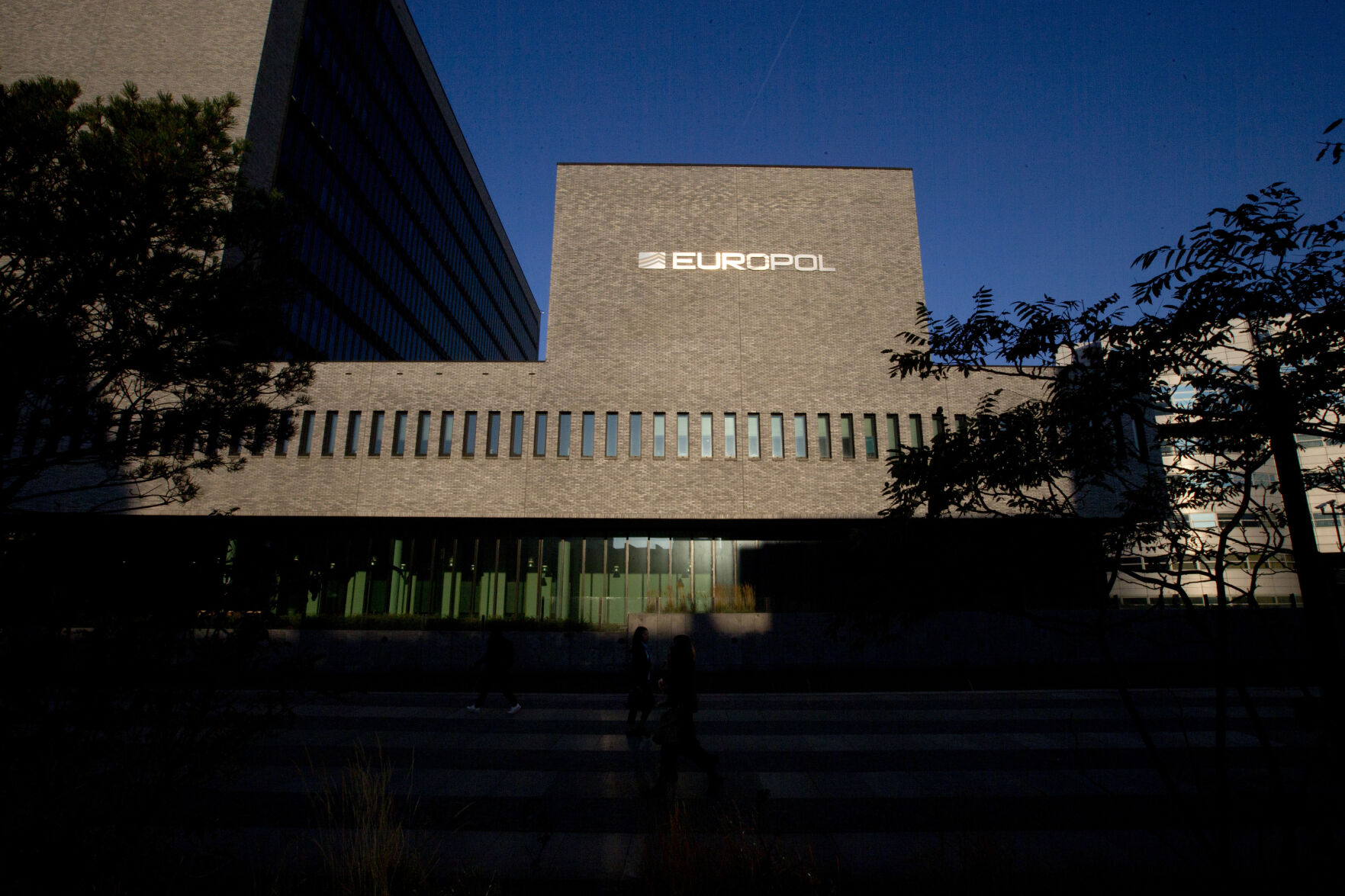 <p>FILE- This Wednesday, Oct. 10, 2018, file photo shows the sun bouncing off the Europol headquarters in The Hague, Netherlands. LEuropean Union law enforcement agency Europol says police around the world have seized an online marketplace and arrested nearly 300 people allegedly involved in buying and selling drugs on the dark web. The operation, coordinated by Europol and targeting the “Monopoly Market,” is the latest major takedown of sales platforms for drugs and other illicit goods on the dark web. Europol said Tuesday, May 2, 2023. (AP Photo/Peter Dejong, File)</p>   PHOTO CREDIT: Peter Dejong 