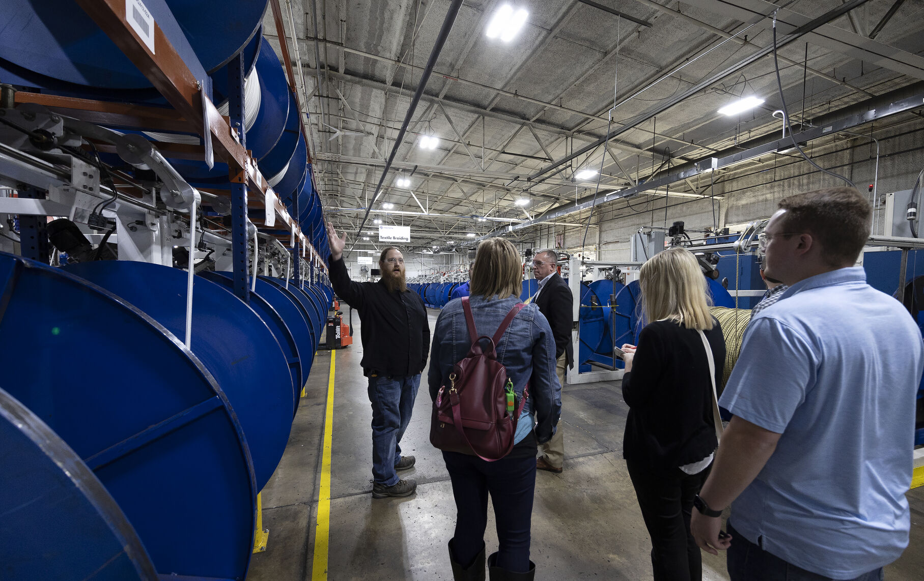 Industrial Automation Engineering Manager Justin Hager (left) leads a tour at ProPulse in Peosta, Iowa, as part of Manufacturing Appreciation Week hosted by Dubuque Area Chamber of Commerce on Tuesday, May 2, 2023.    PHOTO CREDIT: Stephen Gassman