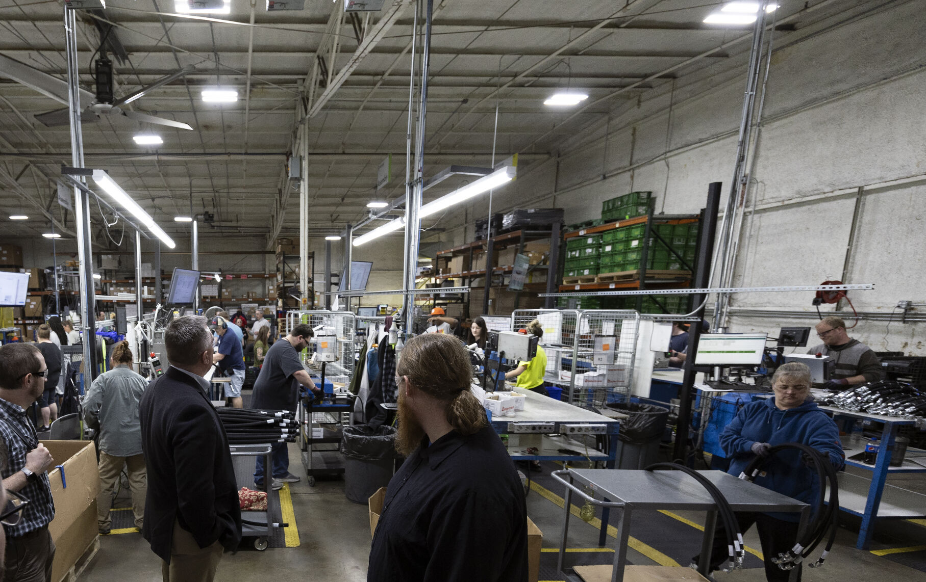 Industrial Automation Engineering Manager Justin Hager (center) leads a tour at ProPulse in Peosta, Iowa, as part of Manufacturing Appreciation Week hosted by Dubuque Area Chamber of Commerce on Tuesday, May 2, 2023.    PHOTO CREDIT: Stephen Gassman