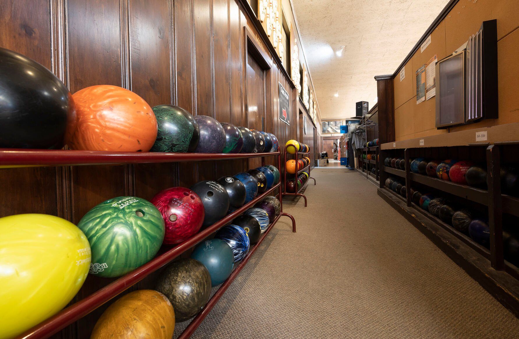 Bowling balls line the walls at Fischer Lanes in Dubuque on Thursday, May 4, 2023.    PHOTO CREDIT: Stephen Gassman
Telegraph Herald