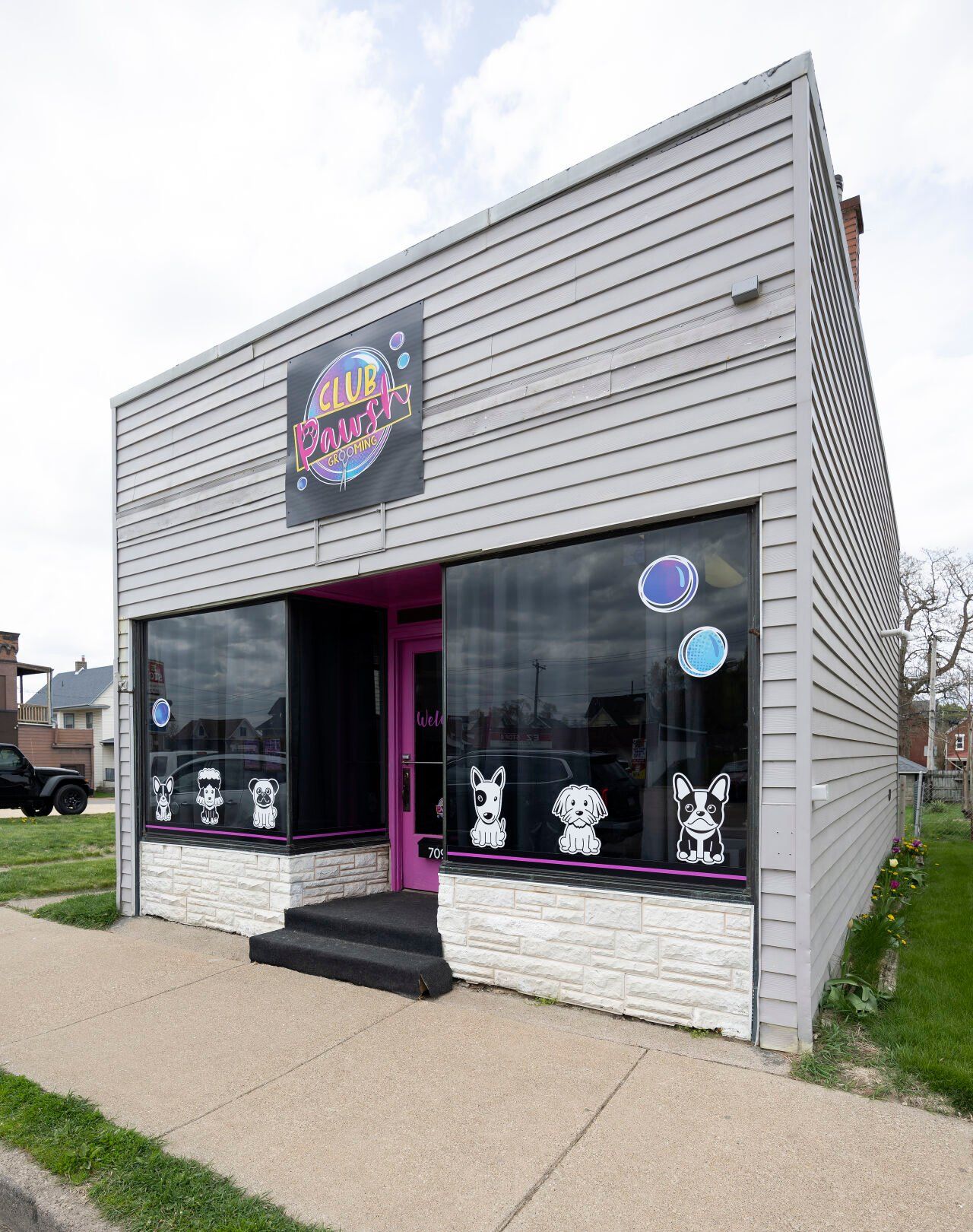 Exterior at Club Pawsh Grooming on Rhomberg Avenue in Dubuque on Friday, May 5, 2023.    PHOTO CREDIT: Gassman