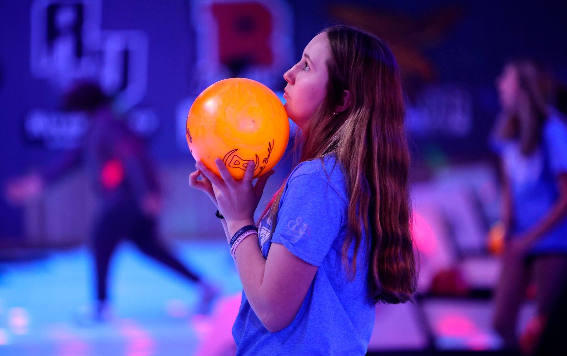 Galena Middle School student Leah Heller looks up at her score before throwing the ball at Pioneer Lanes.    PHOTO CREDIT: Dave Kettering
Telegraph Herald