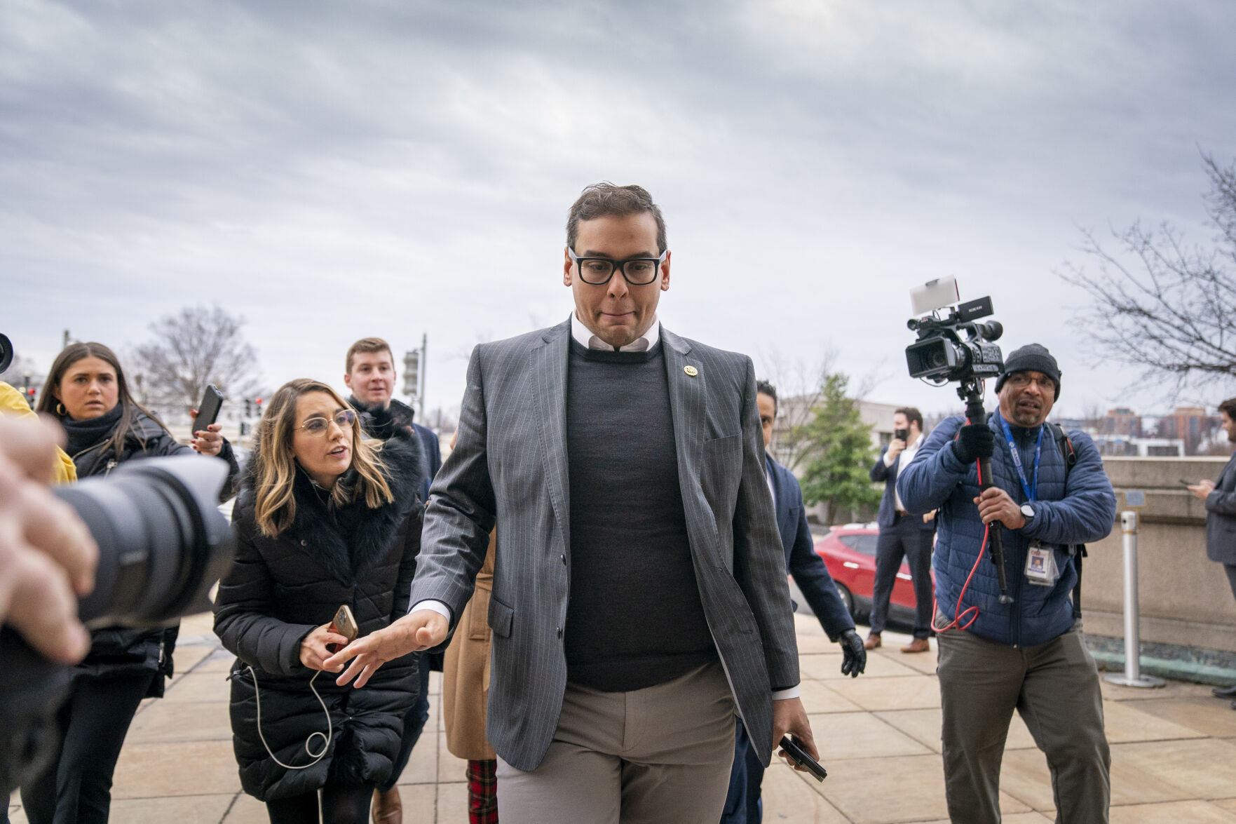 <p>FILE - Rep. George Santos, R-N.Y., leaves a House GOP conference meeting on Capitol Hill in Washington, Jan. 25, 2023. Santos has been arrested on federal criminal charges. The Republican congressman has faced outrage over revelations he fabricated parts of his life story, including lying about being a wealthy Wall Street dealmaker. Santos was arrested Wednesday. (AP Photo/Andrew Harnik, File)</p>   PHOTO CREDIT: Andrew Harnik