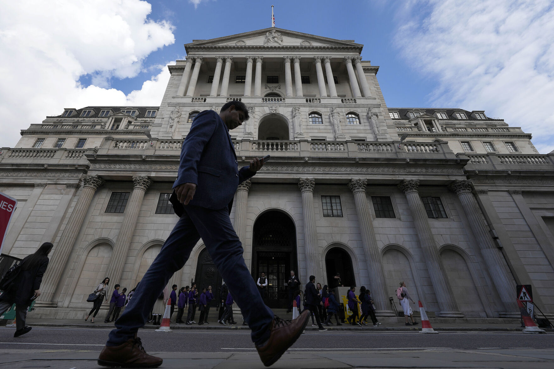 <p>A man walks past the Bank of England, at the financial district in London, Thursday, May 11, 2023. The Bank of England is set to raise interest rates later Thursday to their highest level since late 2008 as it continues to combat stubbornly high inflation in the U.K. (AP Photo/Frank Augstein)</p>   PHOTO CREDIT: Frank Augstein 