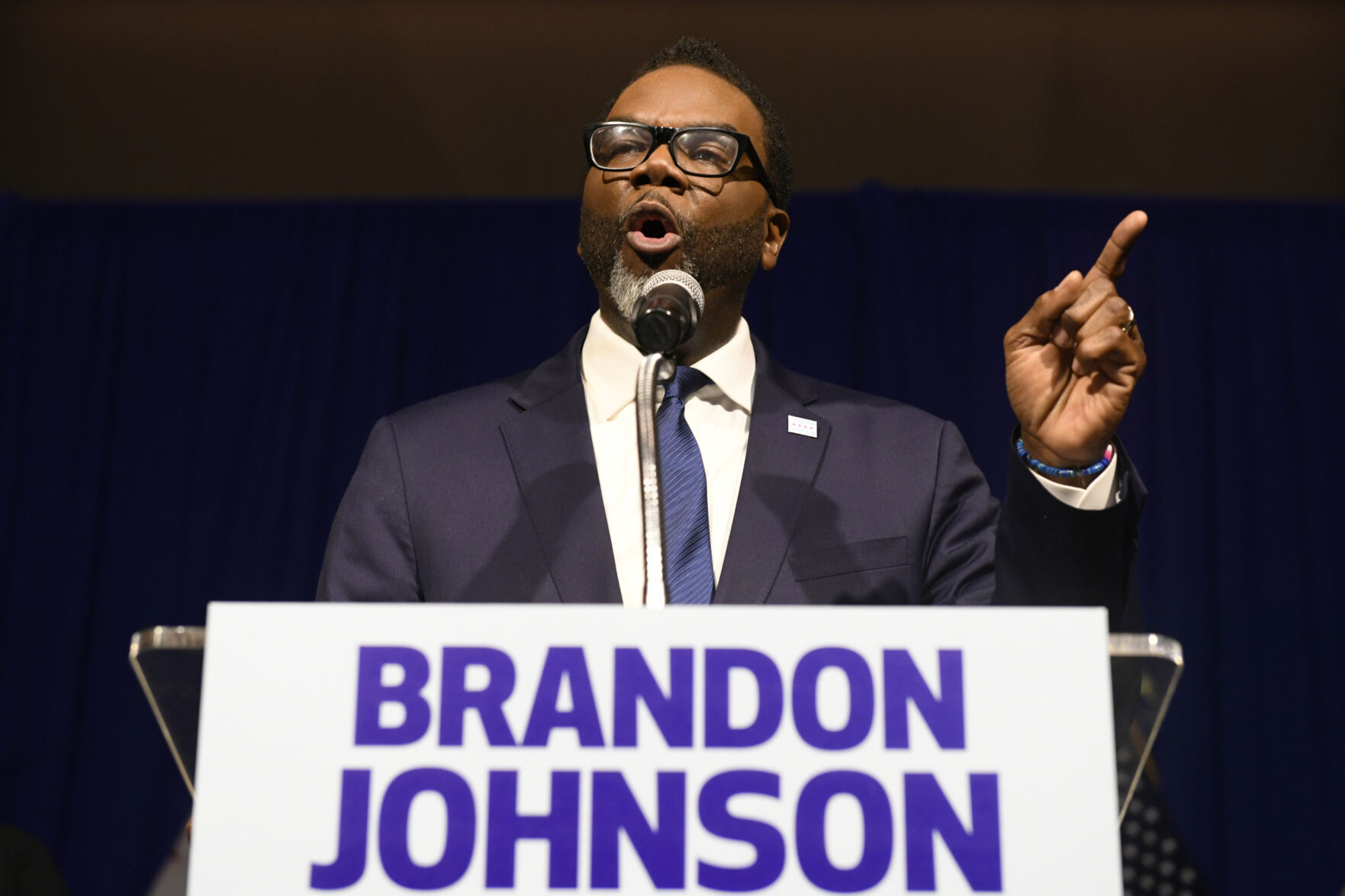 <p>FILE - Chicago Mayor-elect Brandon Johnson speaks to supporters, April 4, 2023, in Chicago. Johnson will take office Monday, May 15, 2023. He faces an influx of migrants in desperate need of shelter, pressure to build support among skeptical business leaders and summer months that historically bring a spike in violent crime. (AP Photo/Paul Beaty, file)</p>   PHOTO CREDIT: Paul Beaty