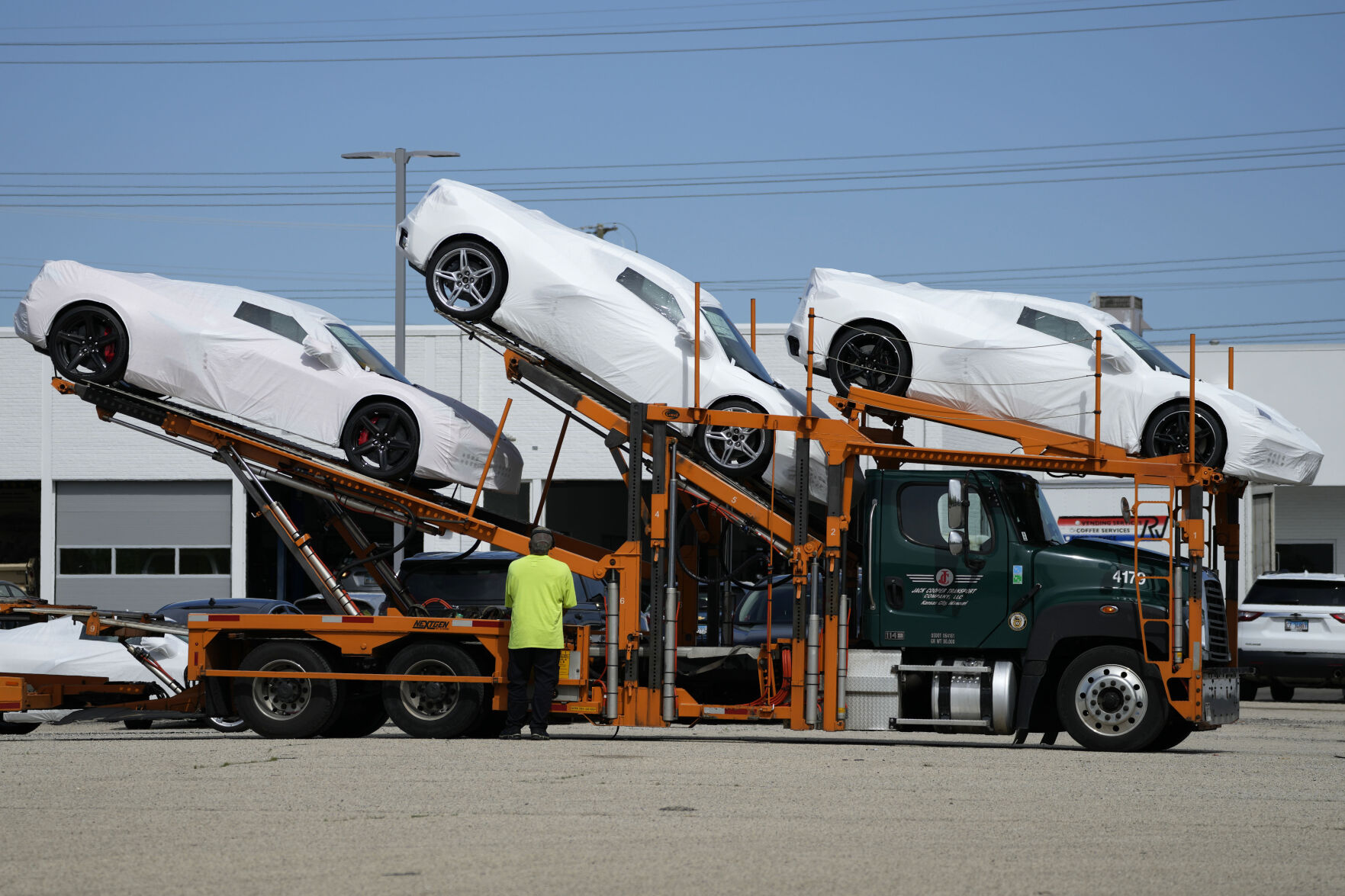 <p>New Corvettes are delivered to a Chevrolet dealer in Wheeling, Ill., Tuesday, May 9, 2023. On Thursday, the Commerce Department issues its second of three estimates of how the U.S. economy performed in the first quarter of 2023.(AP Photo/Nam Y. Huh)</p>   PHOTO CREDIT: Nam Y. Huh