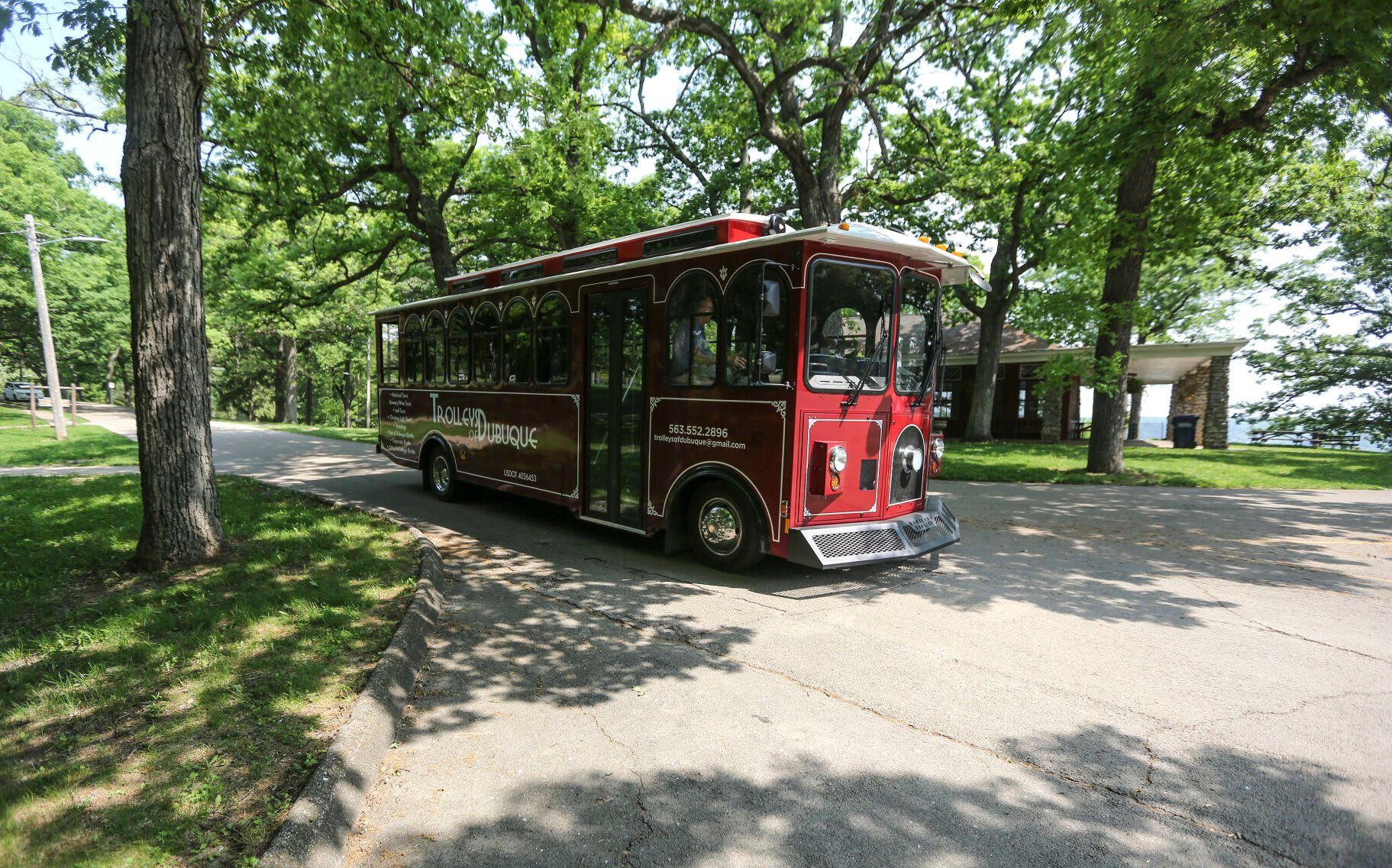 Trolleys of Dubuque makes its way through Eagle Point Park in Dubuque on May 24.    PHOTO CREDIT: Dave Kettering