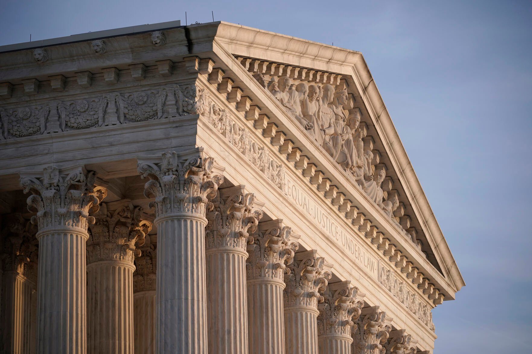 <p>FILE - The Supreme Court is seen in Washington, on Nov. 5, 2020. The Supreme Court says it will hear a case in which a man tried to trademark a phrase mocking former President Donald Trump as “too small.” (AP Photo/J. Scott Applewhite, File)</p>   PHOTO CREDIT: J. Scott Applewhite