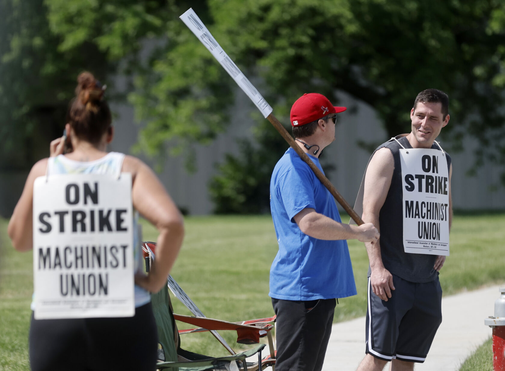 Andrew Winders (left) and Scott Rumple, both employees at A.Y. McDonald Mfg. Co., picket outside the facility on Chavenelle Road in Dubuque on Thursday, June 1, 2023.    PHOTO CREDIT: JESSICA REILLY