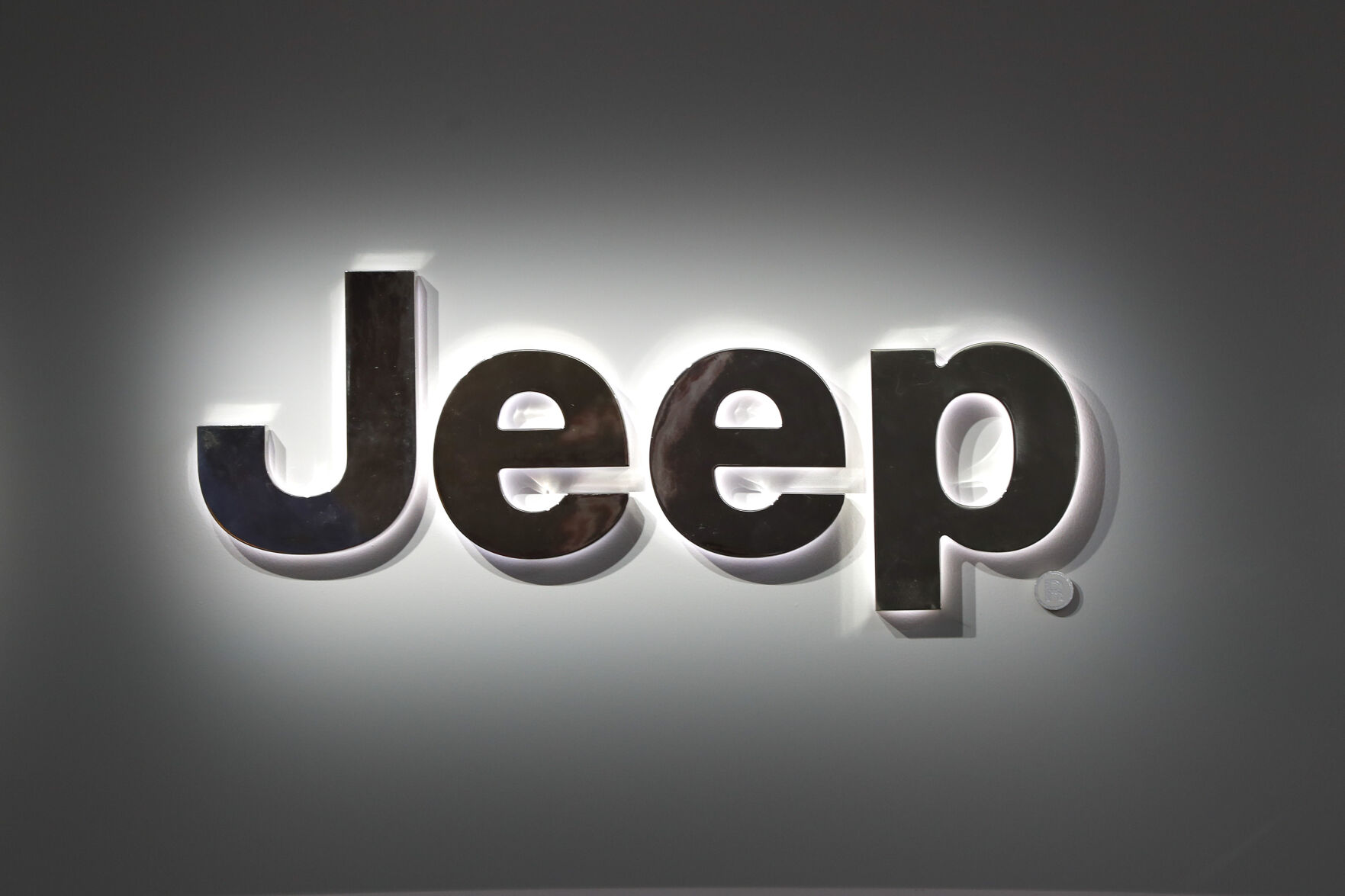 <p>FILE - This Jan. 14, 2019 photo shows a Jeep logo at the North American International Auto Show in Detroit. Stellantis is recalling more than 354,000 Jeeps worldwide, Tuesday, June 13, 2023, because the rear coil springs can fall off while they’re being driven. The recall covers certain 2022 and 2023 Grand Cherokee and 2021 to 2023 Grand Cherokee L SUVs. (AP Photo/Paul Sancya, File)</p>   PHOTO CREDIT: Paul Sancya 